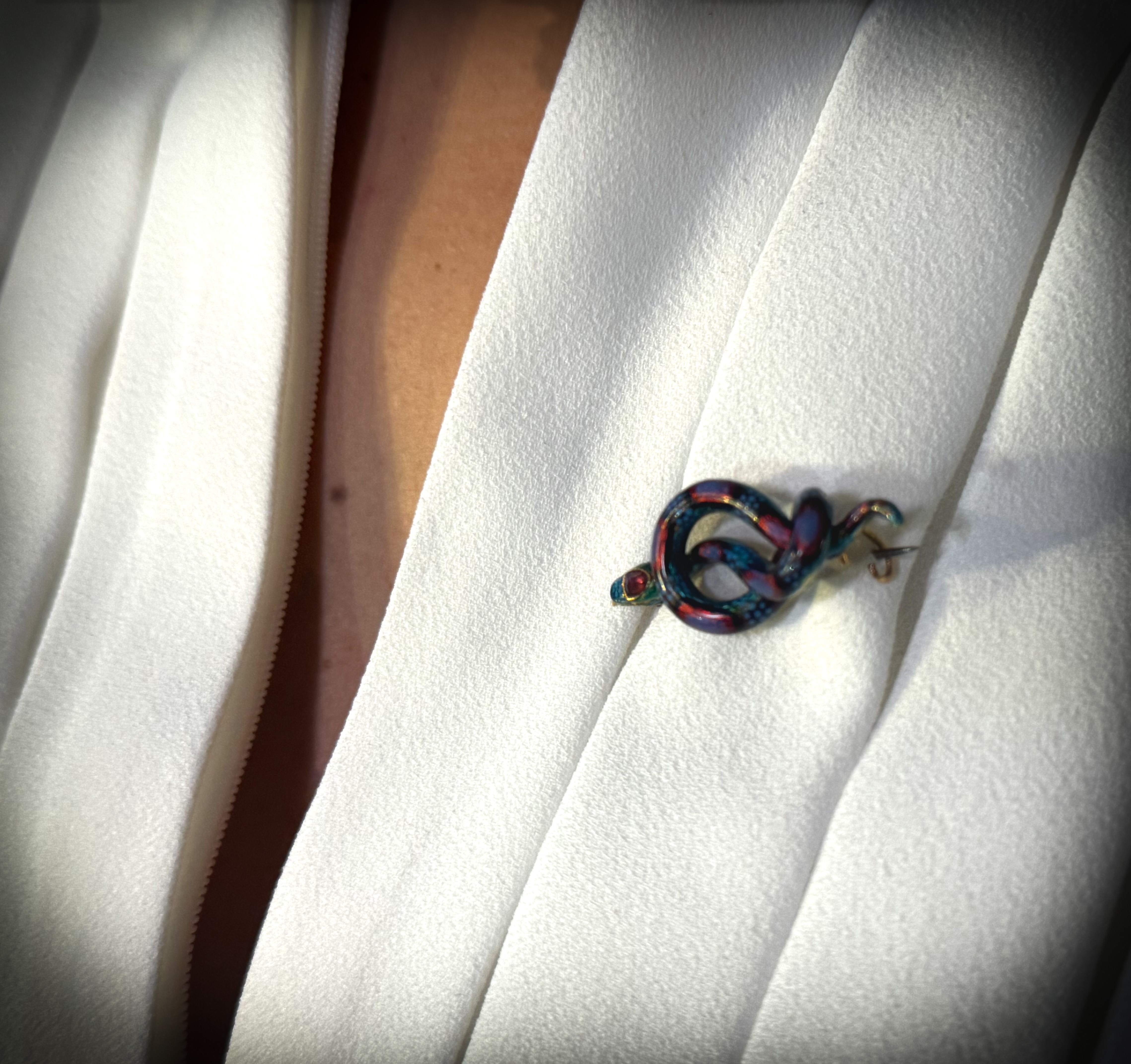 A Late 19th c. French gold and enamel snake brooch. (c. 1860)