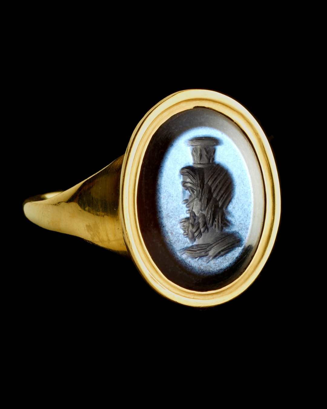 A gold ring with a Roman nicolo intaglio. Jupiter-Serapis.