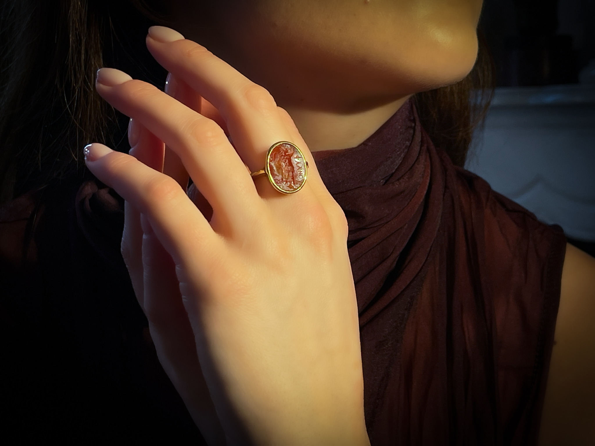 Roman, A gold ring set with a Roman carnelian intaglio. Sol Invictus. (2nd - 3rd century A.D.)