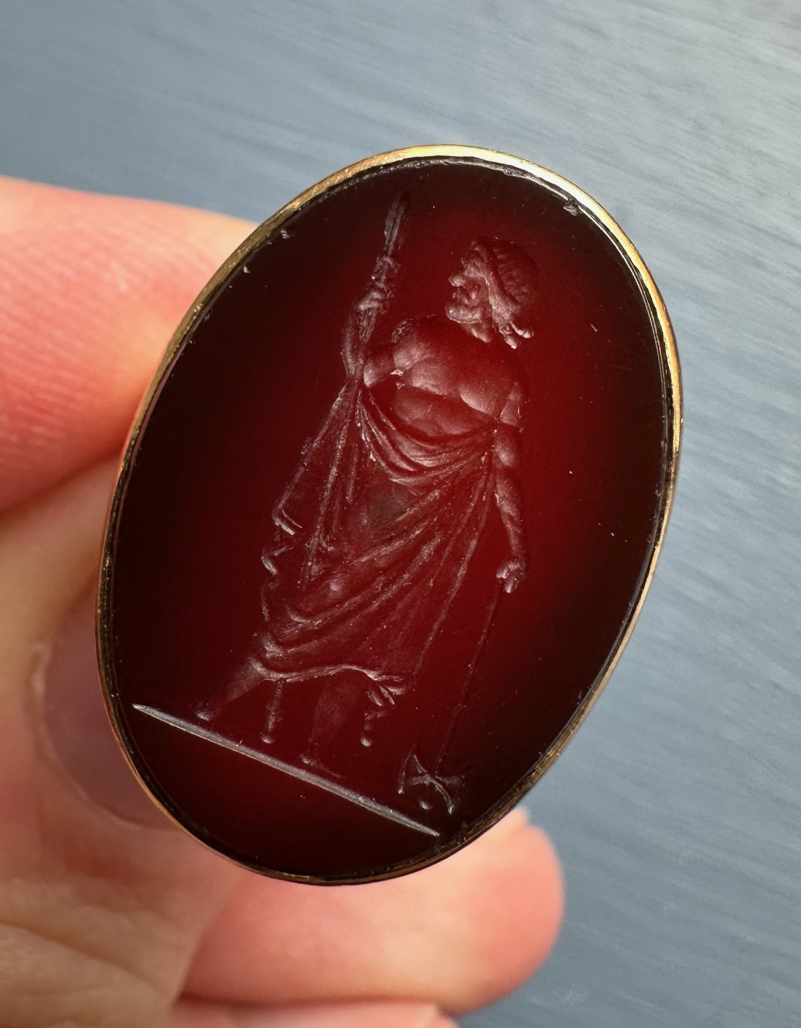 A Neoclassical carnelian intaglio set in an 18k gold ring. Zeus Labraundos, after the Hekatomnid coinage of Halikarnassos.