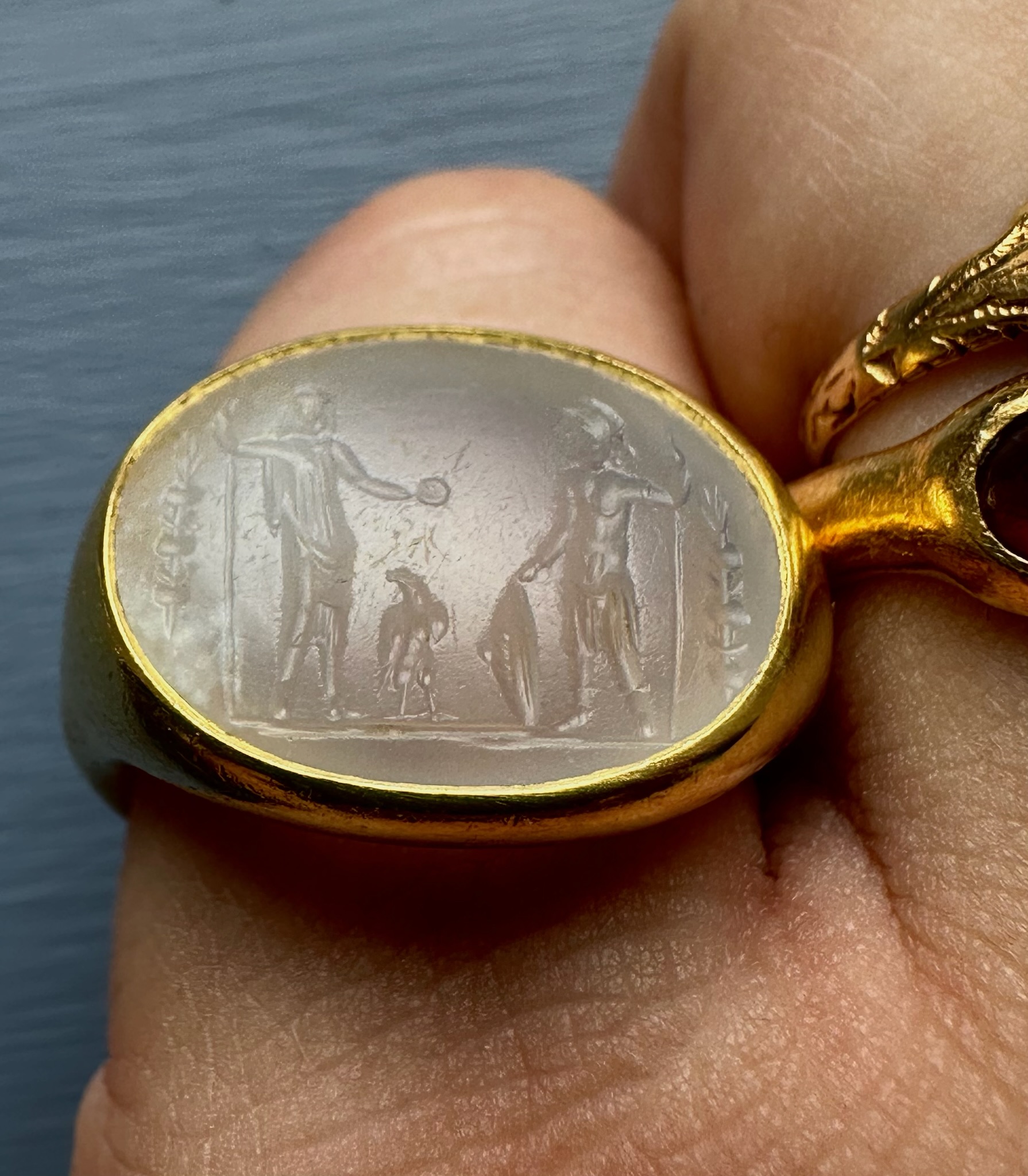 A Large Roman Chalcedony intaglio set in a later massive 22k ring. Jupiter and Mars.