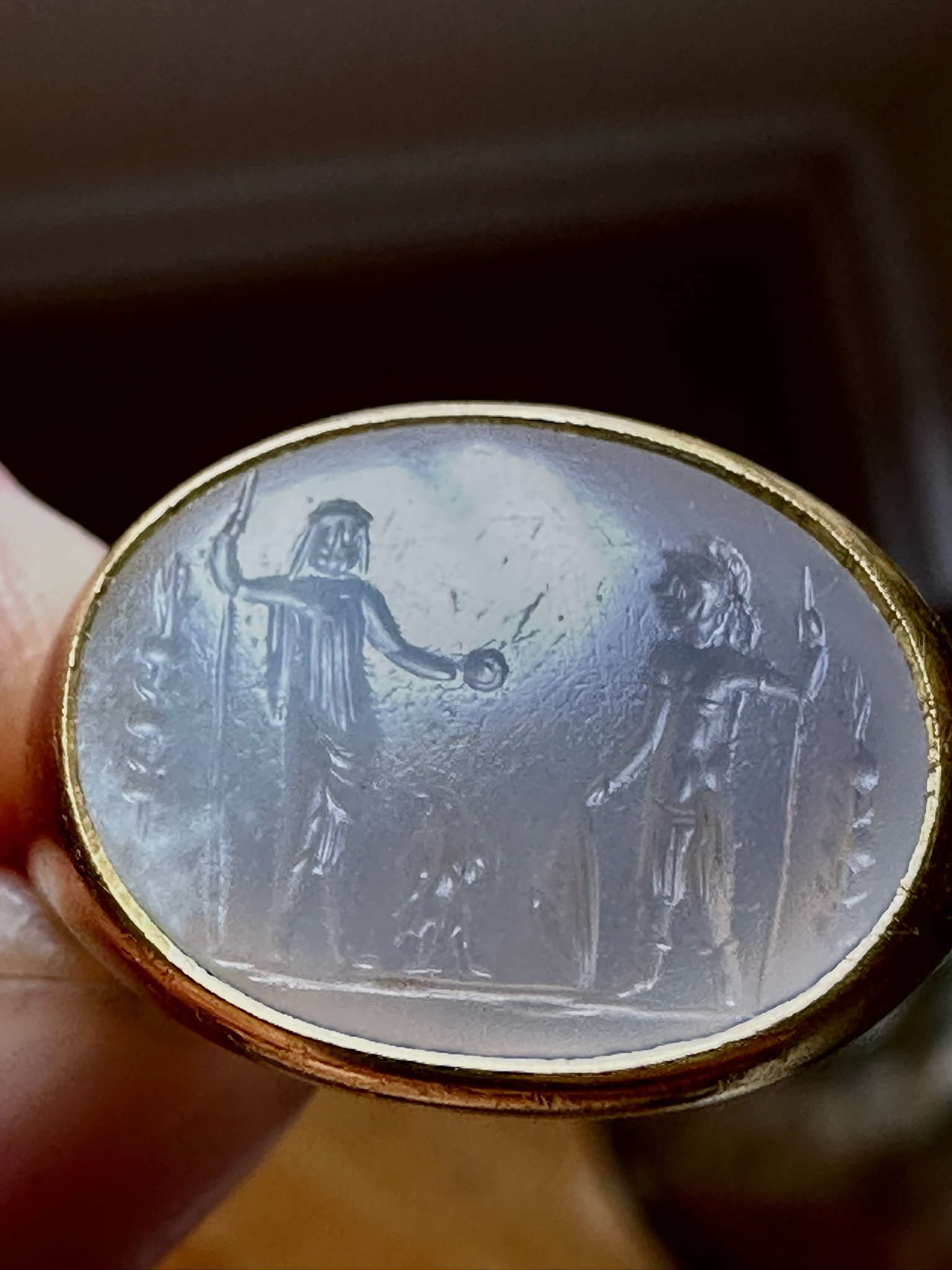 A Large Roman Chalcedony intaglio set in a later massive 22k ring. Jupiter and Mars.