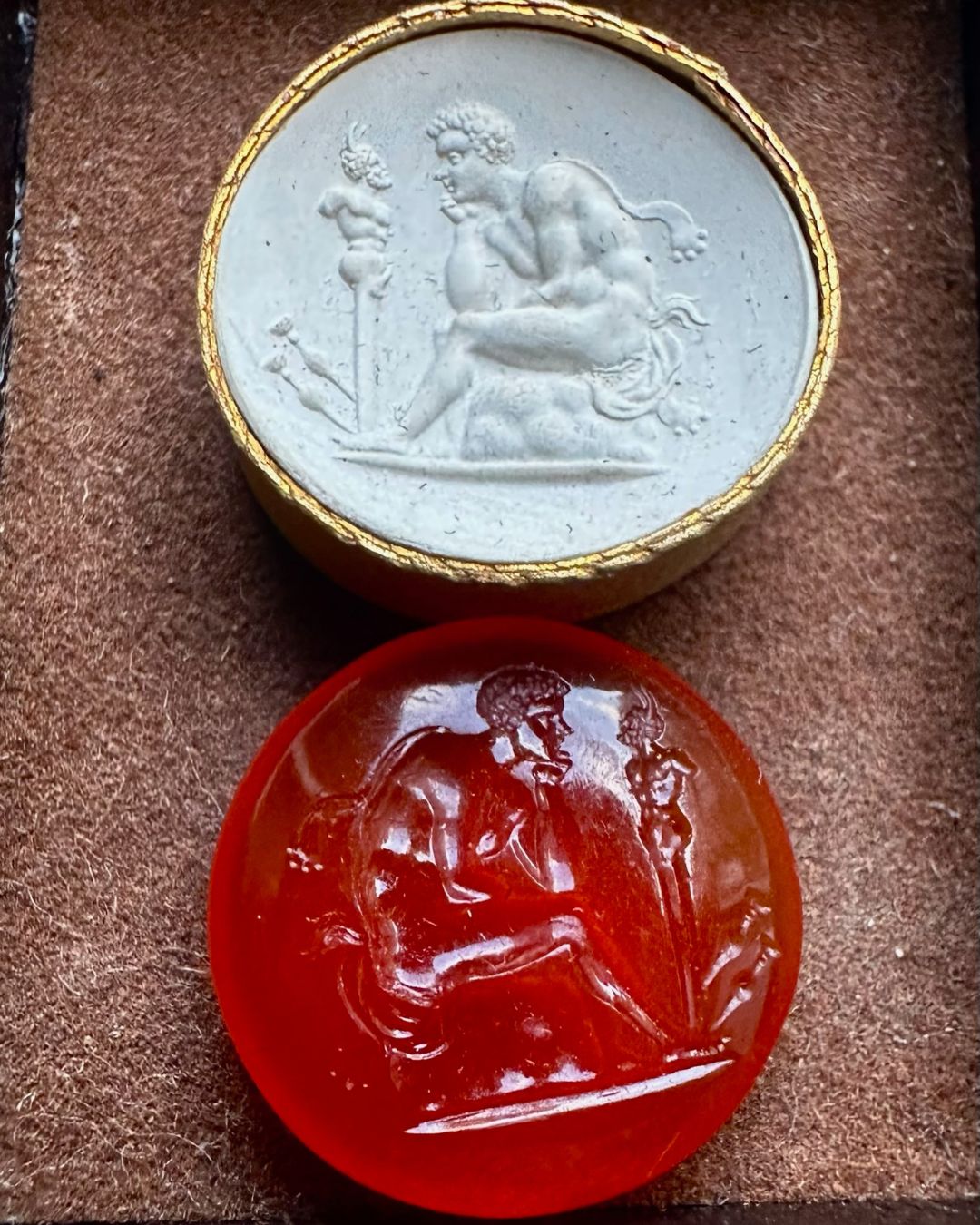 A Grand Tour Carnelian Intaglio A Young Faun Seated before a Herm of Pan