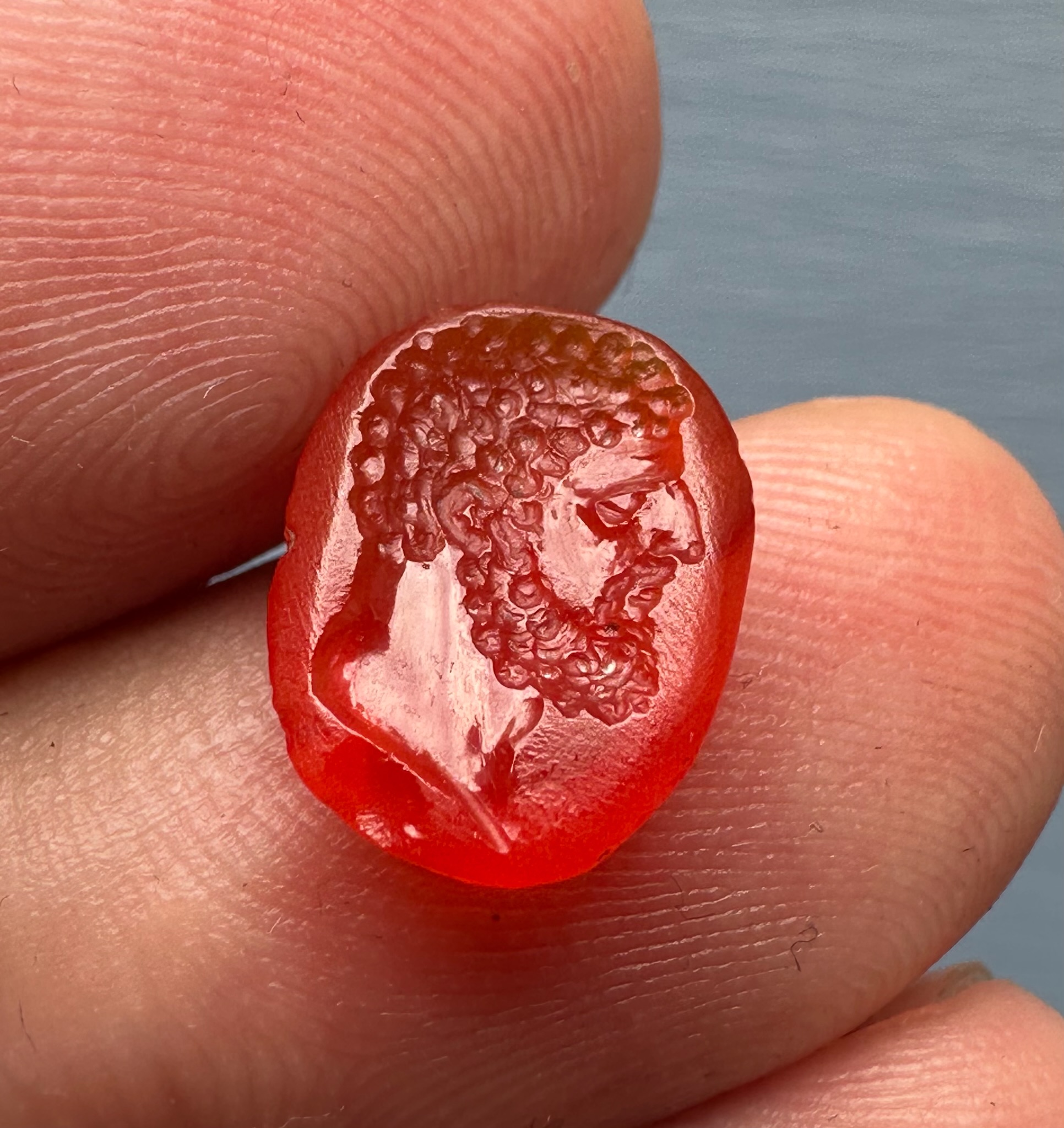 A Roman imperial carnelian intaglio. Portrait of Hercules.