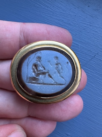 A Gold Brooch set with a Late 18th c.  Nicolo Intaglio — Youth and Satyr