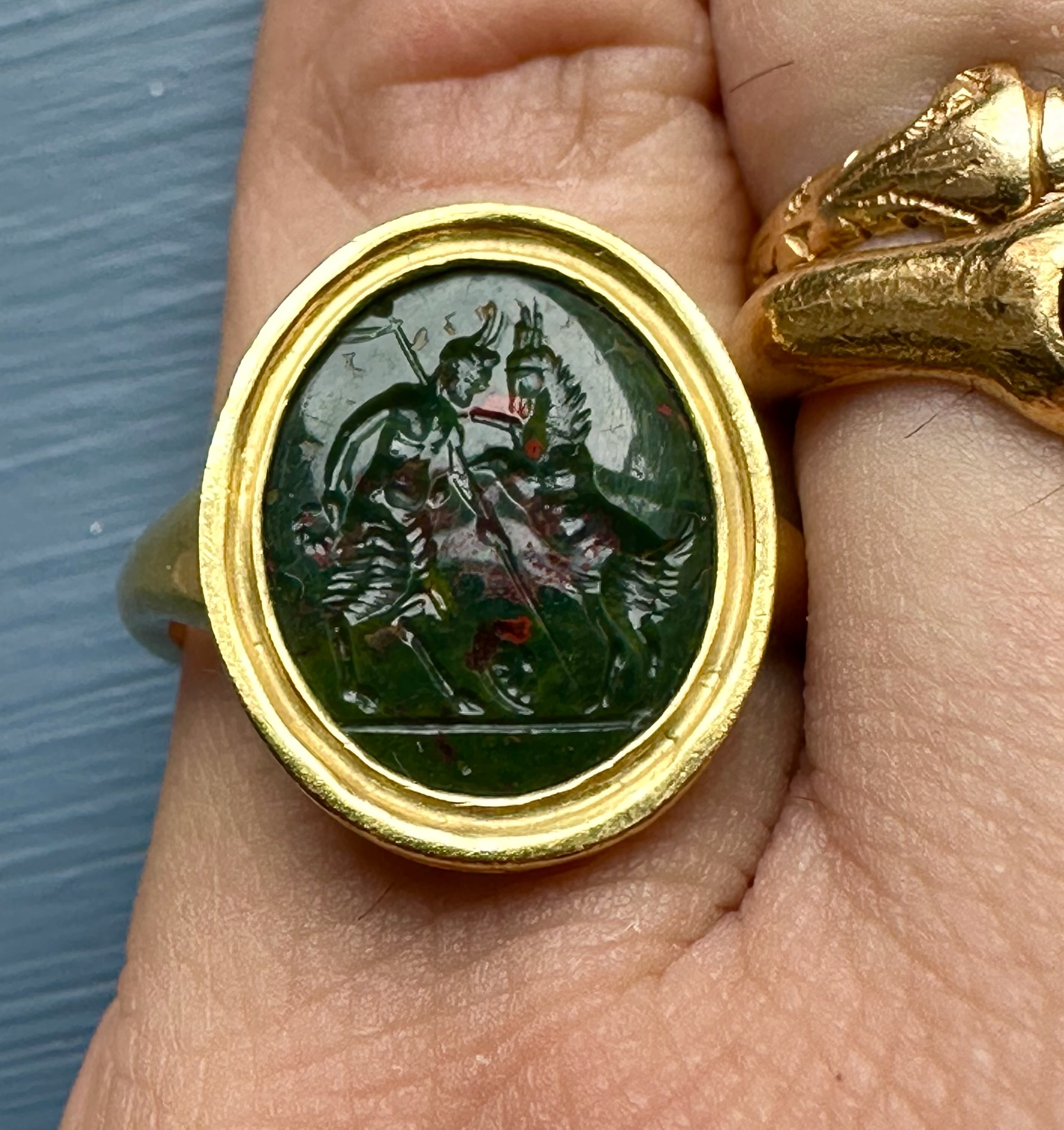 A Renaissance or earlier Jasper Intaglio set in a later gold ring. Satyre with a goat. 