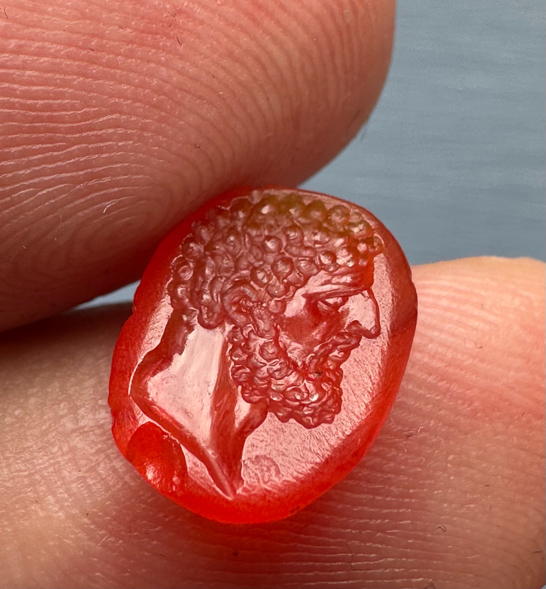 A Roman imperial carnelian intaglio. Portrait of Hercules.