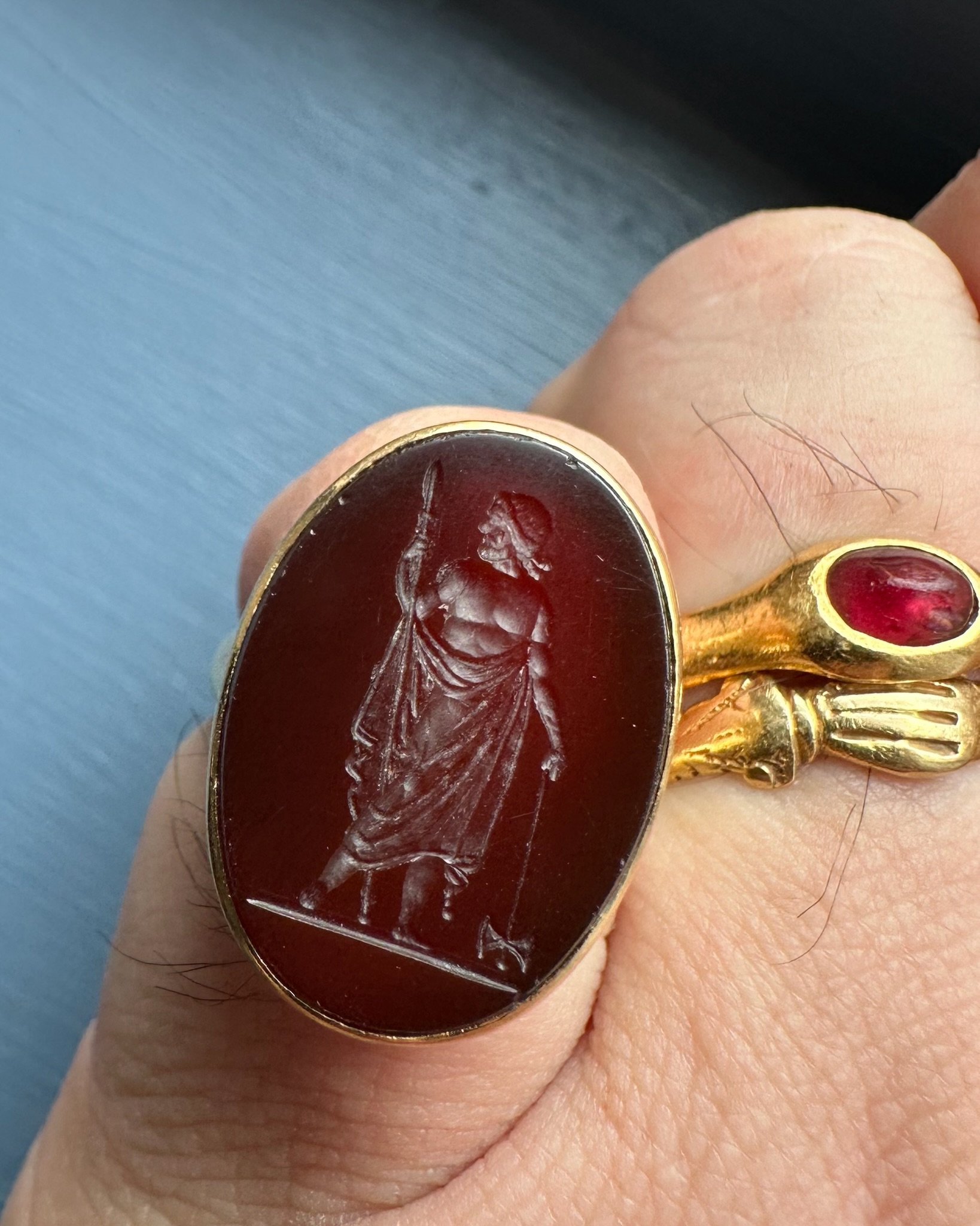 A Neoclassical carnelian intaglio set in an 18k gold ring. Zeus Labraundos, after the Hekatomnid coinage of Halikarnassos.