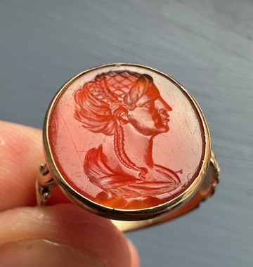 A Grand Tour carnelian intaglio gold ring, portrait of a Roman matrona