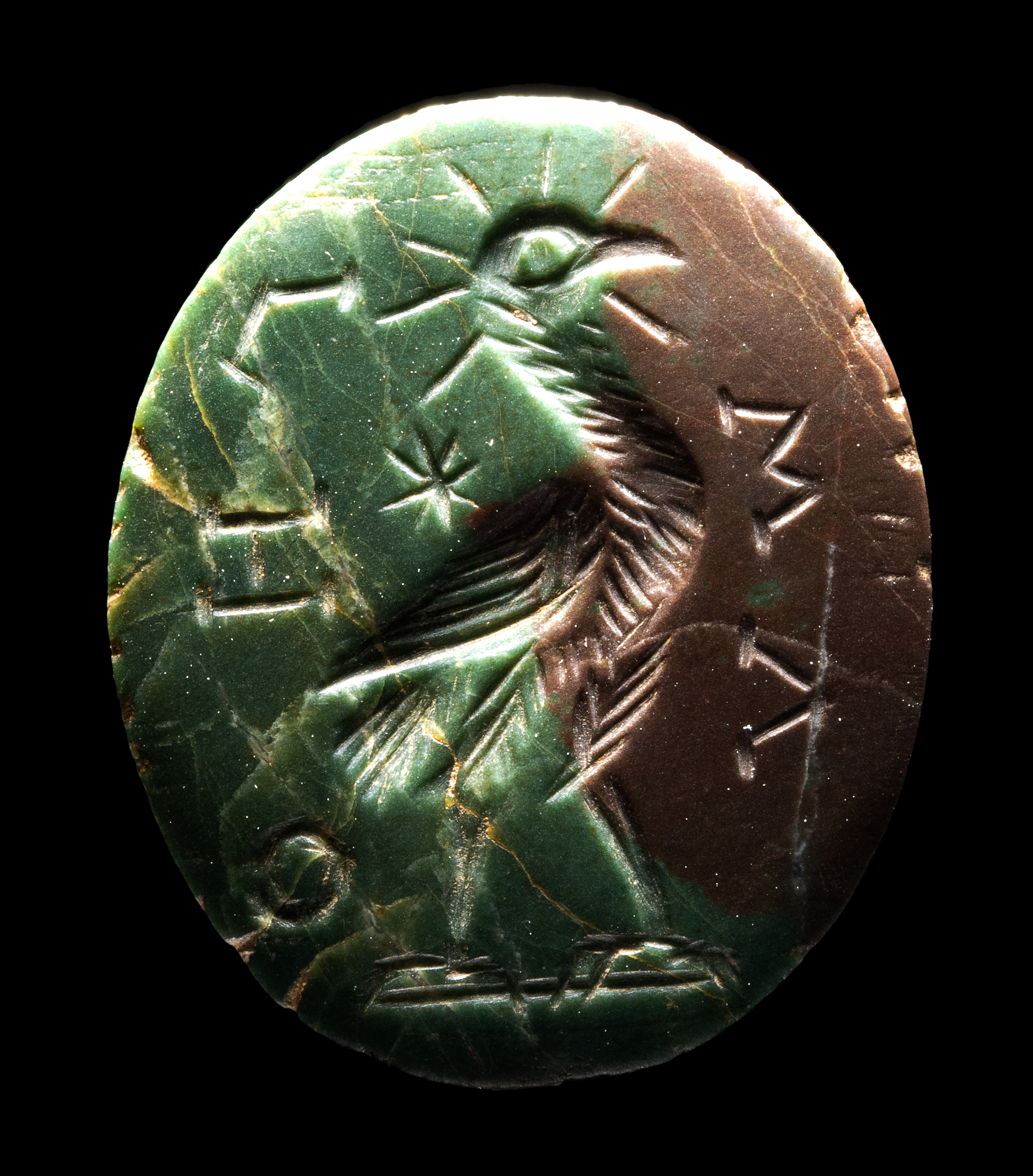 Roman, *A Roman gnostic green and brown jasper intaglio. Phoenix.  (2nd-3rd century A.D.)