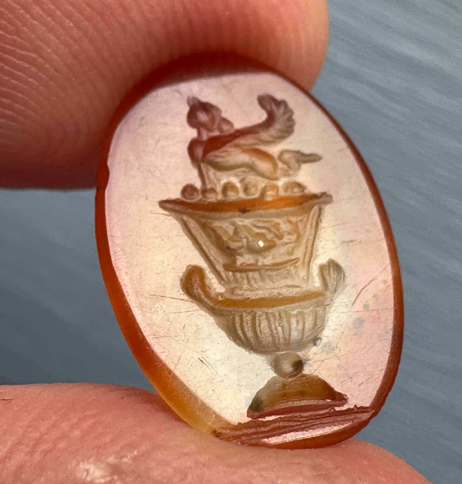 A large Roman agate intaglio. Sphinx on a bell-krater.