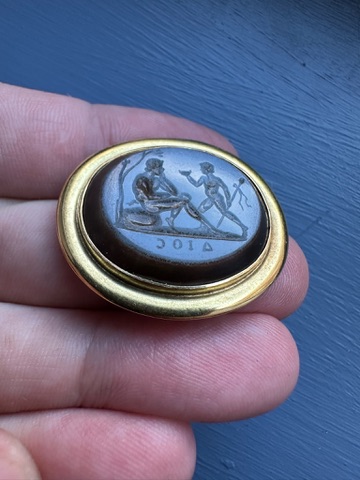 A Gold Brooch set with a Late 18th c.  Nicolo Intaglio — Youth and Satyr