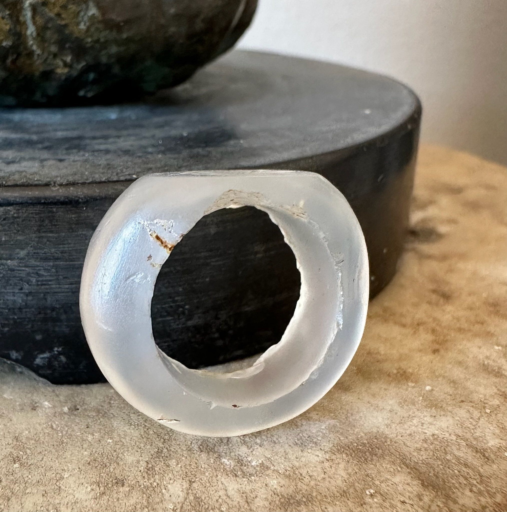 A Sasanian hololithic chalcedony seal ring. Flower.