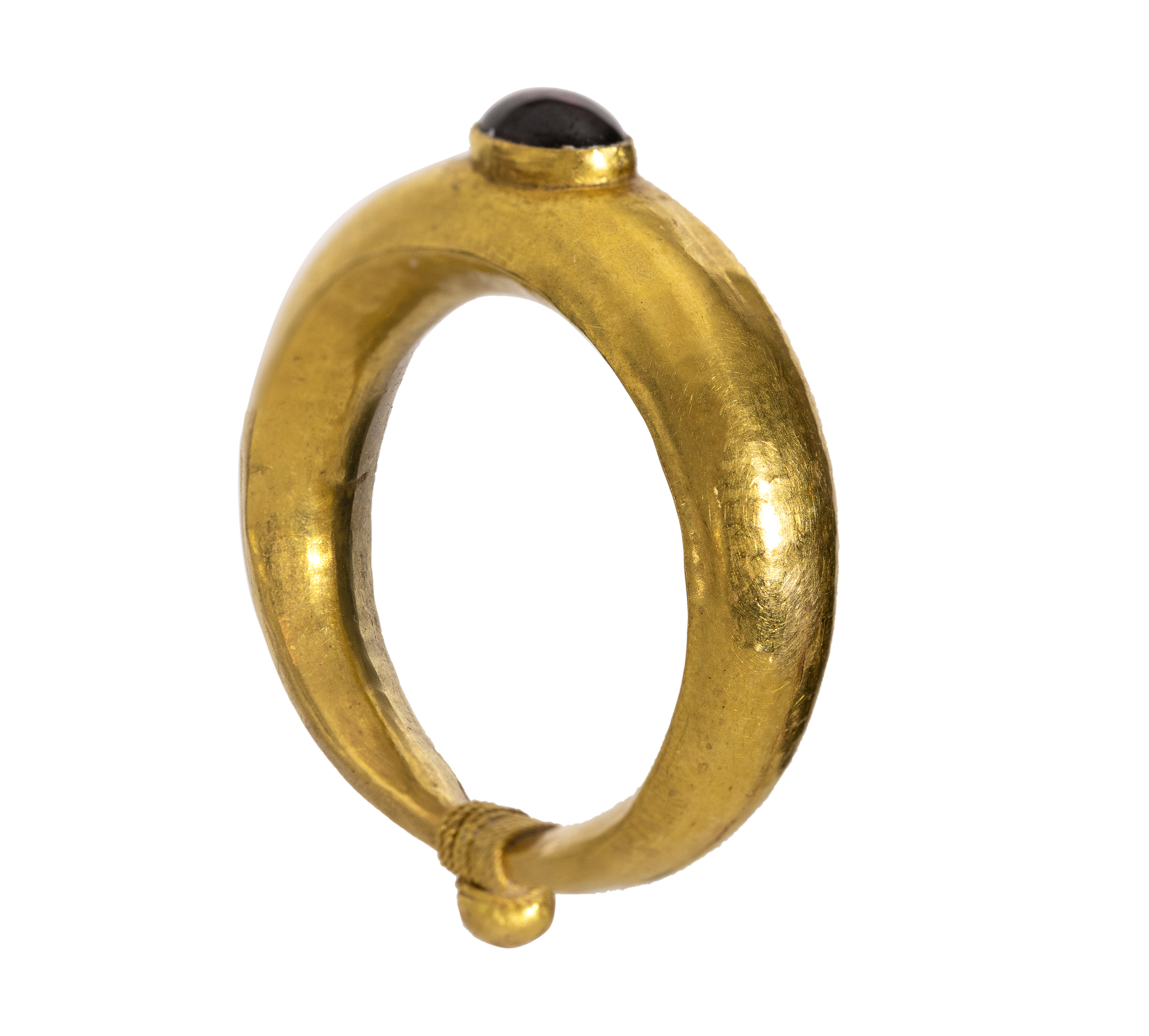 A Roman Gold and Garnet Cabochon ring.