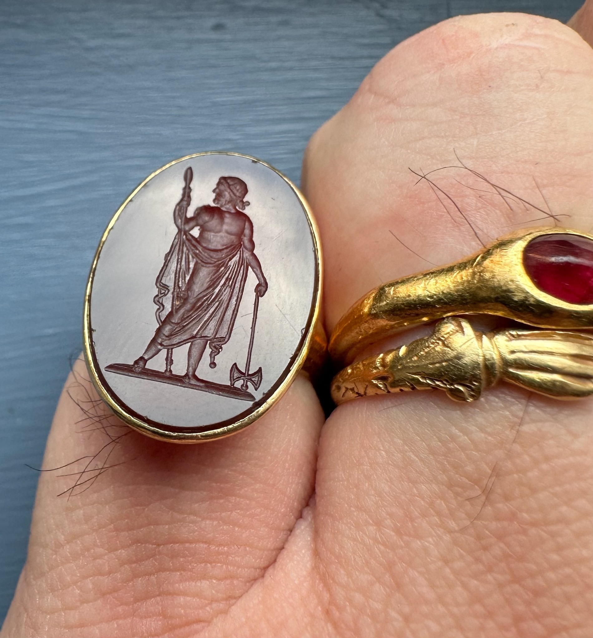A Neoclassical carnelian intaglio set in an 18k gold ring. Zeus Labraundos, after the Hekatomnid coinage of Halikarnassos.