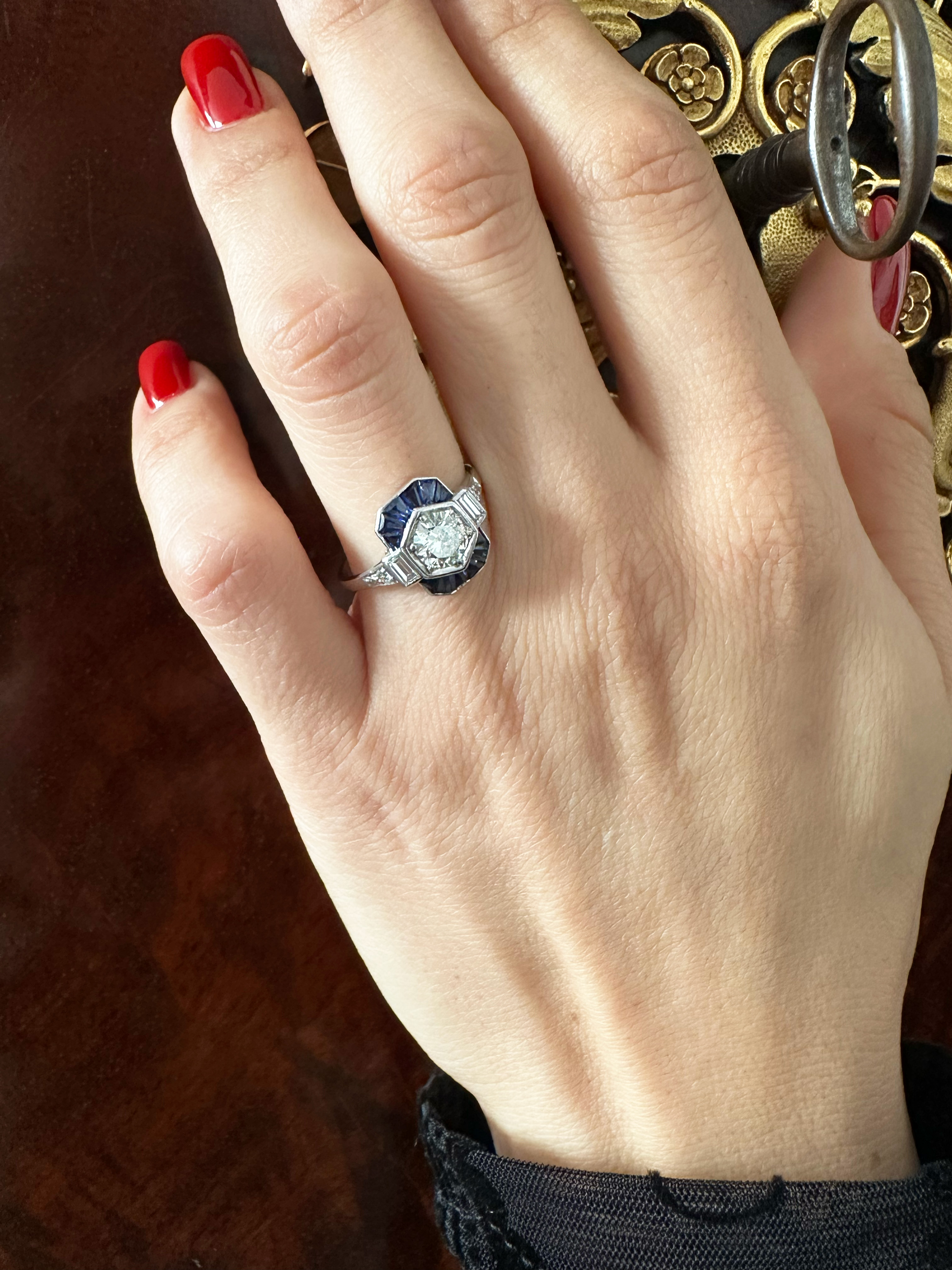 An Art Deco diamond and sapphire dress ring 