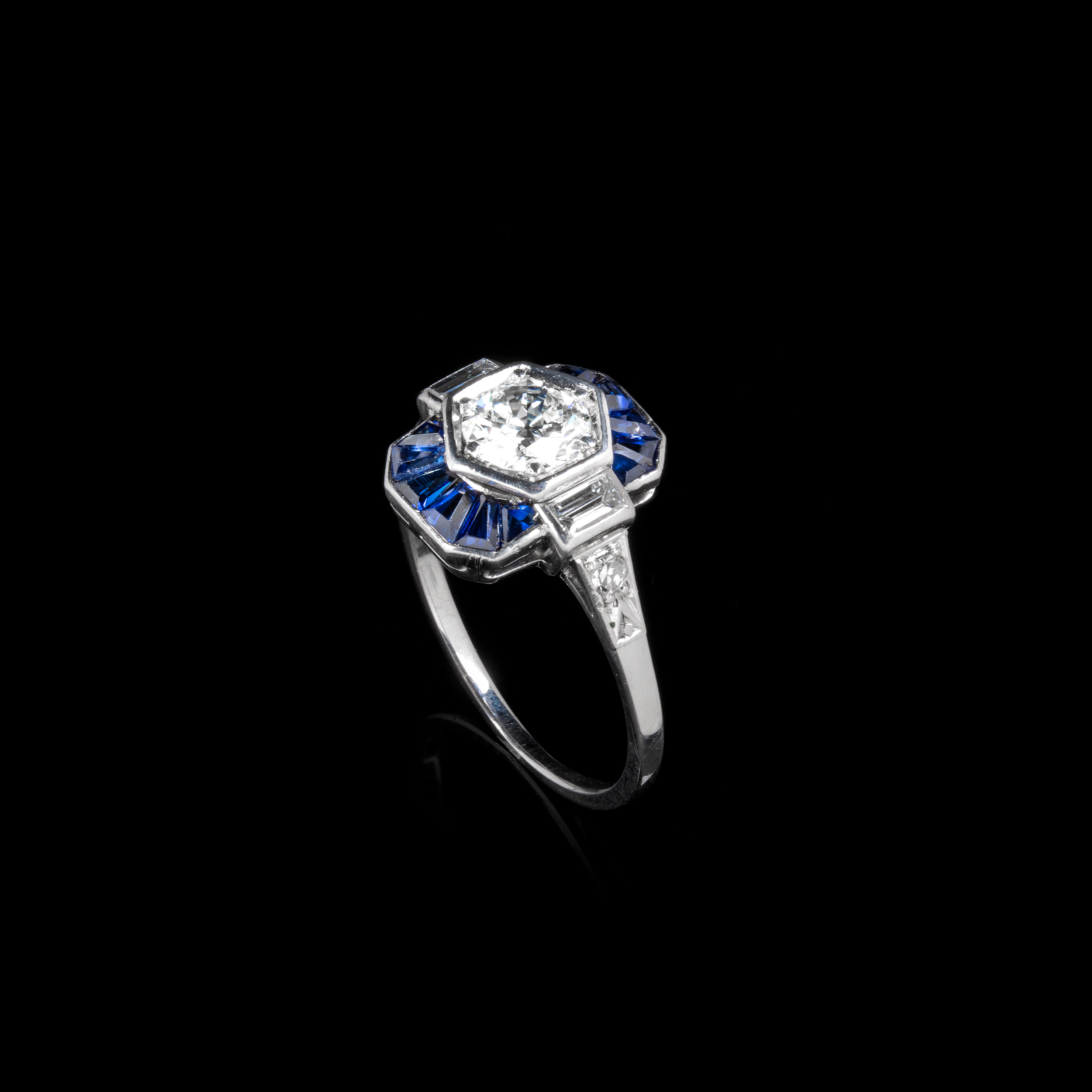 An Art Deco diamond and sapphire dress ring 