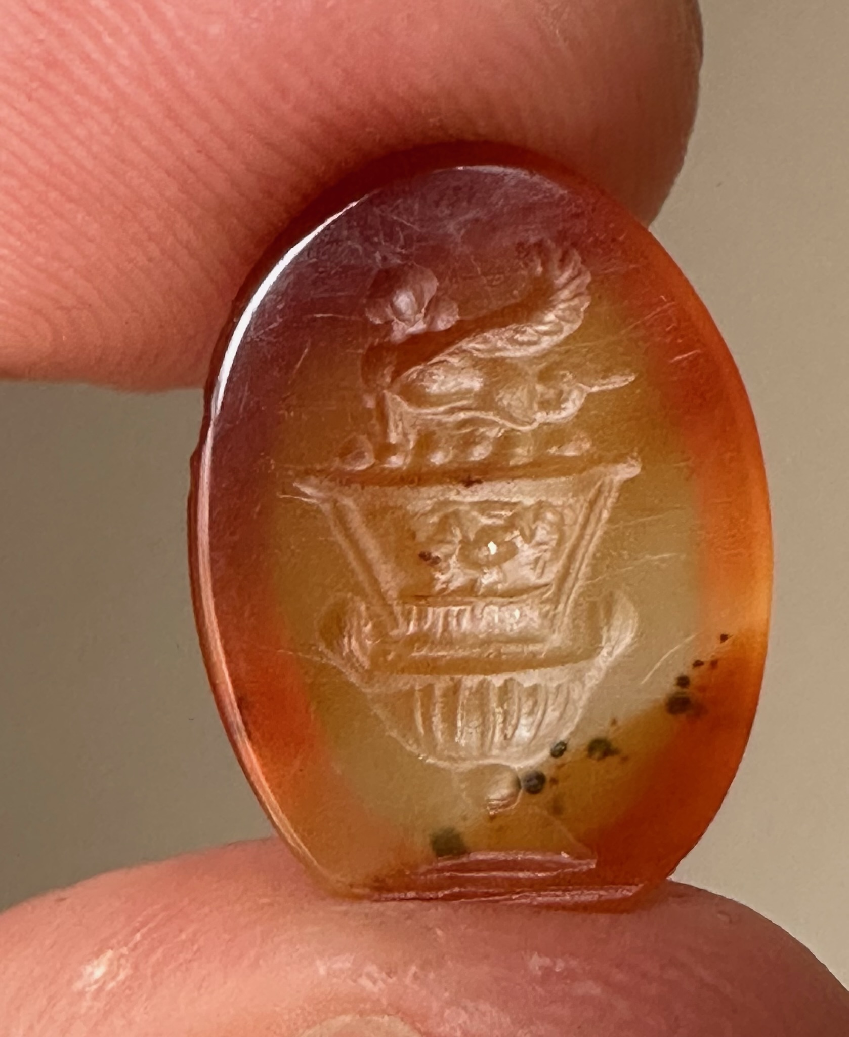 A large Roman agate intaglio. Sphinx on a bell-krater.