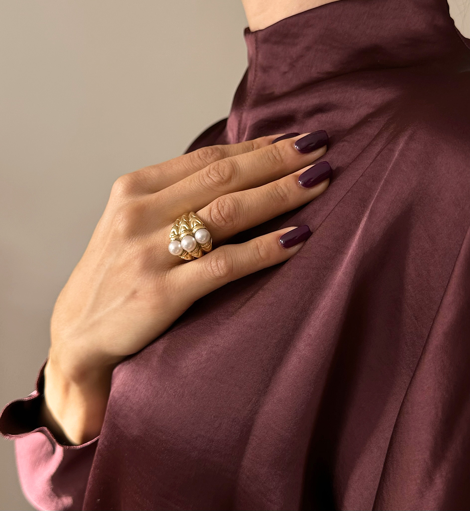 Bulgari. A "Passo Doppio" gold ring with pearls.  (1990s)