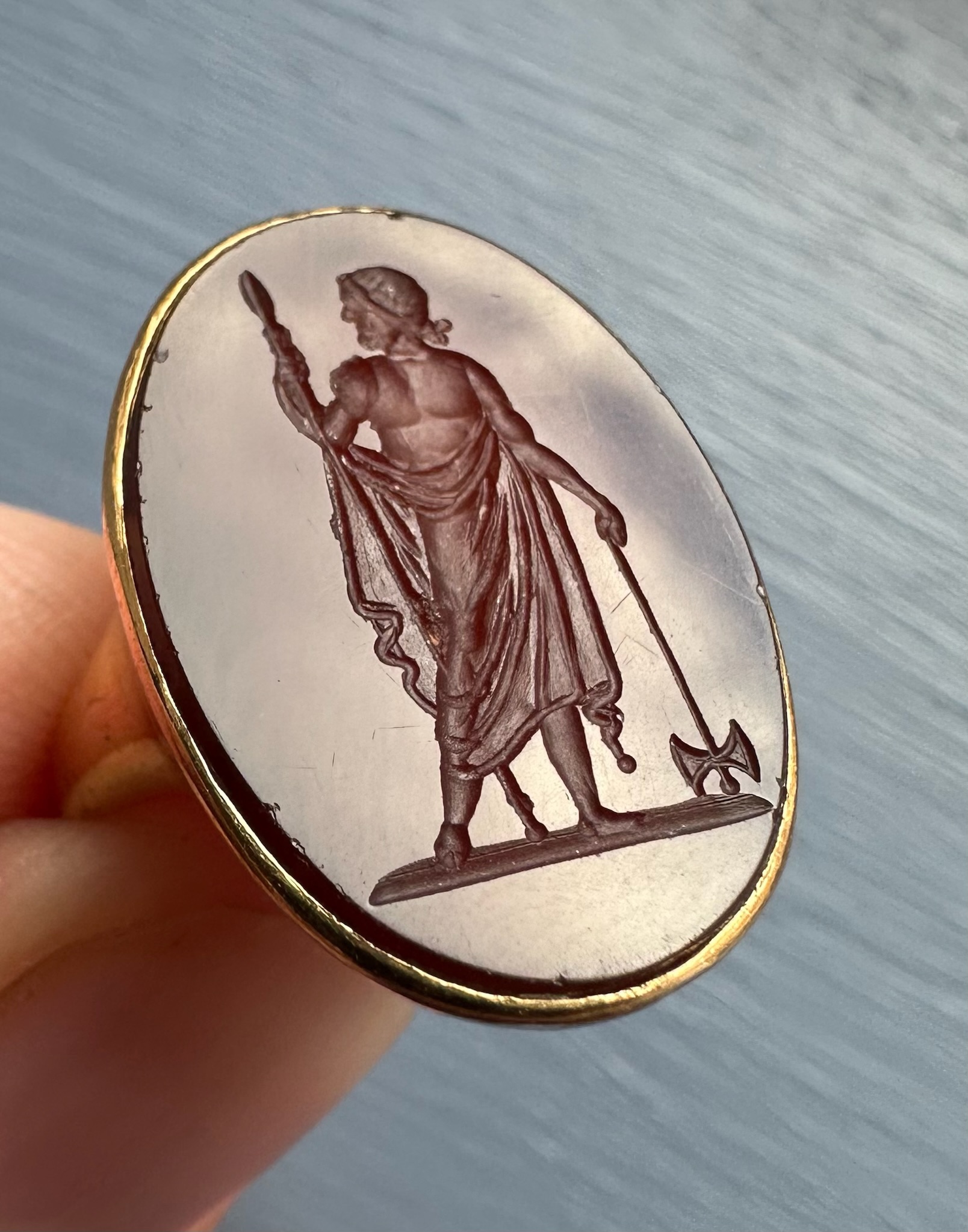A Neoclassical carnelian intaglio set in an 18k gold ring. Zeus Labraundos, after the Hekatomnid coinage of Halikarnassos.