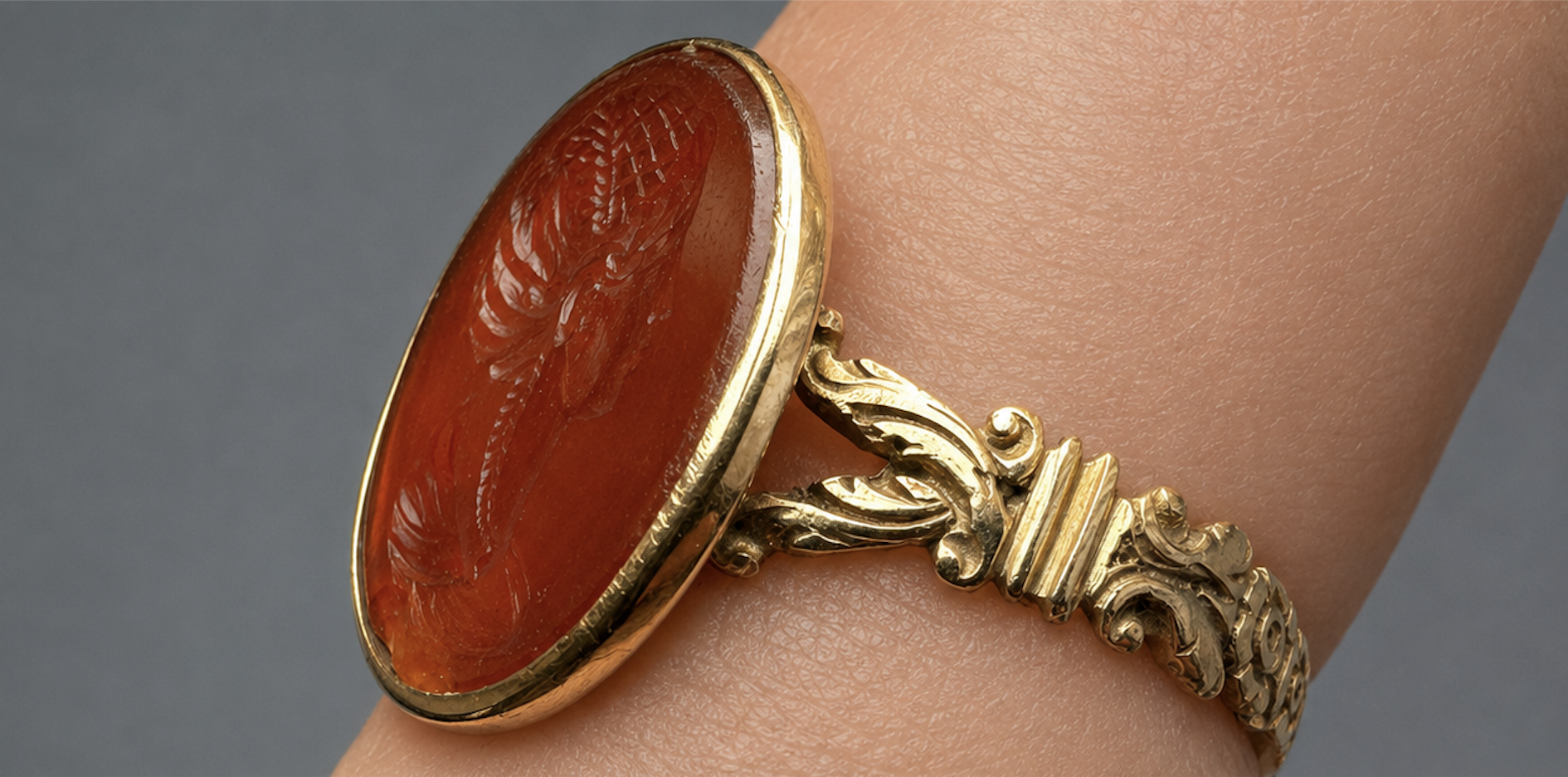 A Grand Tour carnelian intaglio gold ring, portrait of a Roman matrona