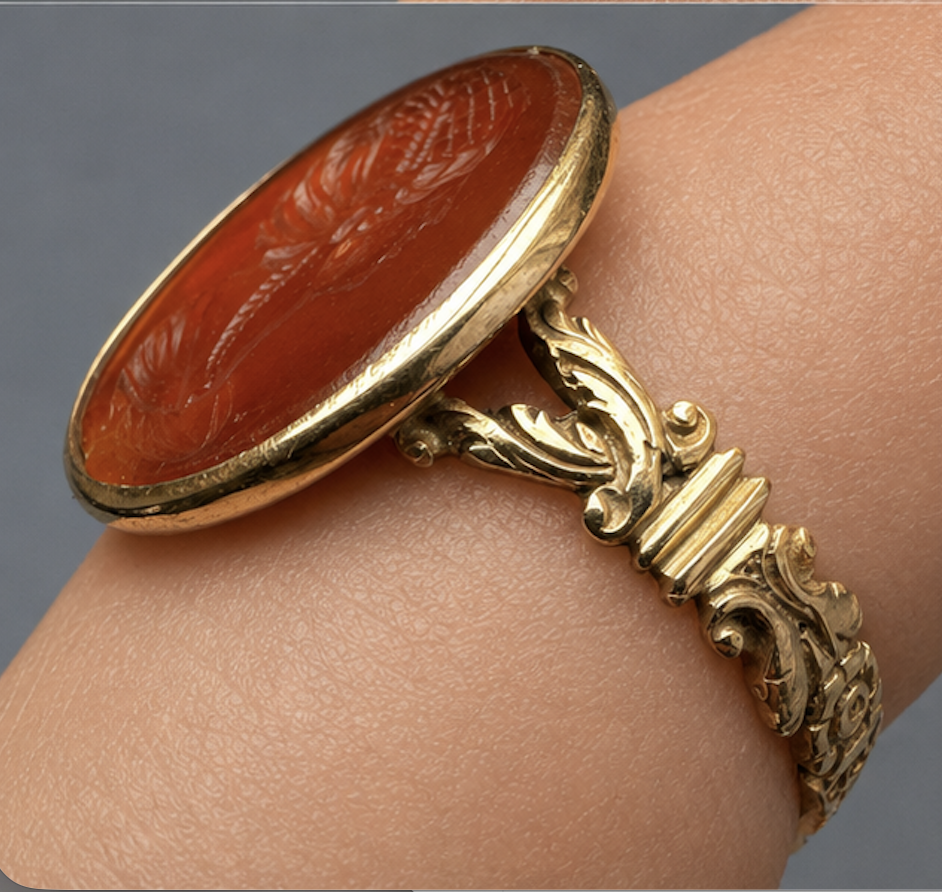 A Grand Tour carnelian intaglio gold ring, portrait of a Roman matrona