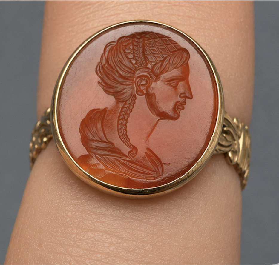 A Grand Tour carnelian intaglio gold ring, portrait of a Roman matrona