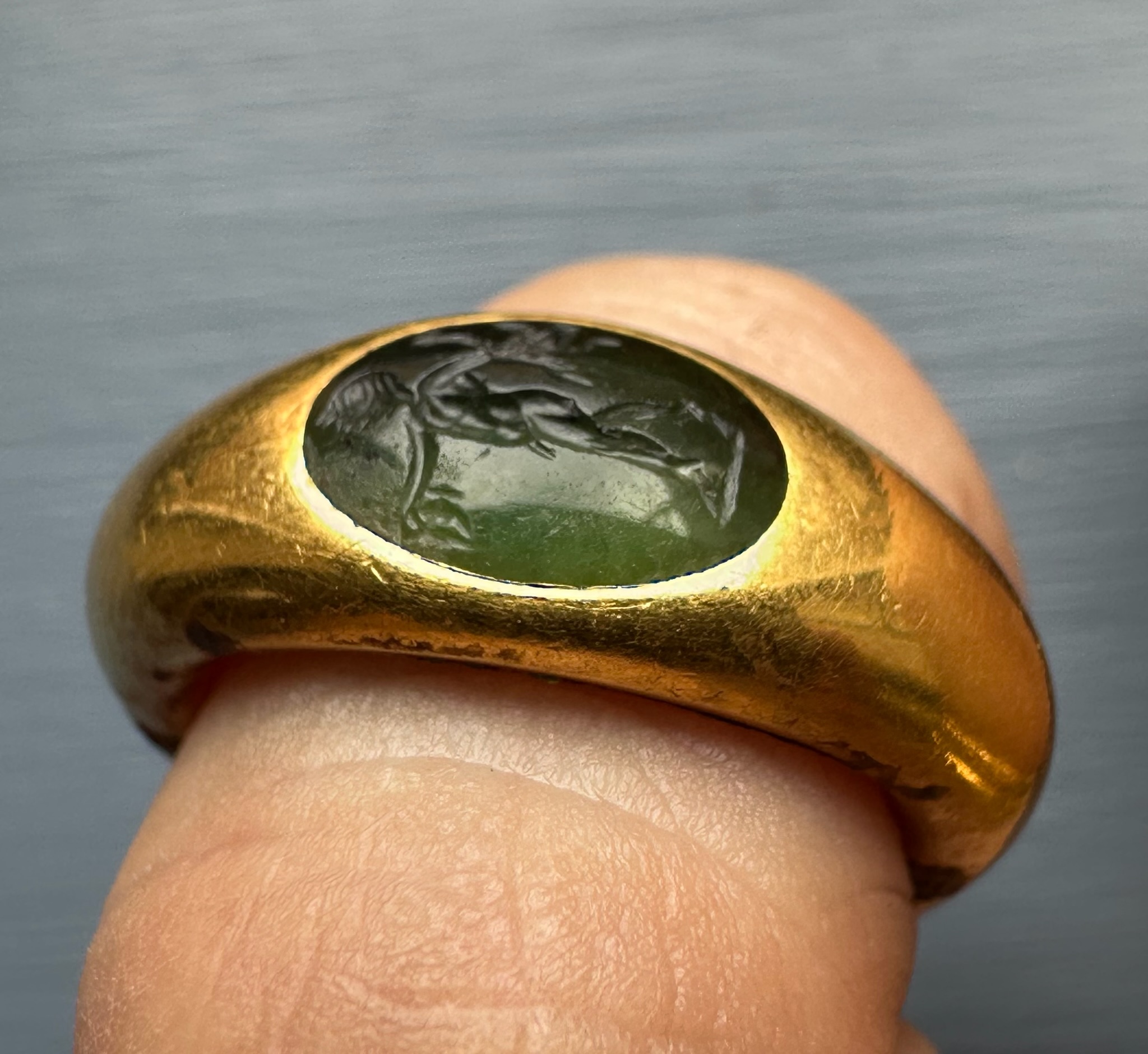Roman Gold and Green Chalcedony Finger Ring. Satyr with Dionysiac Attributes.