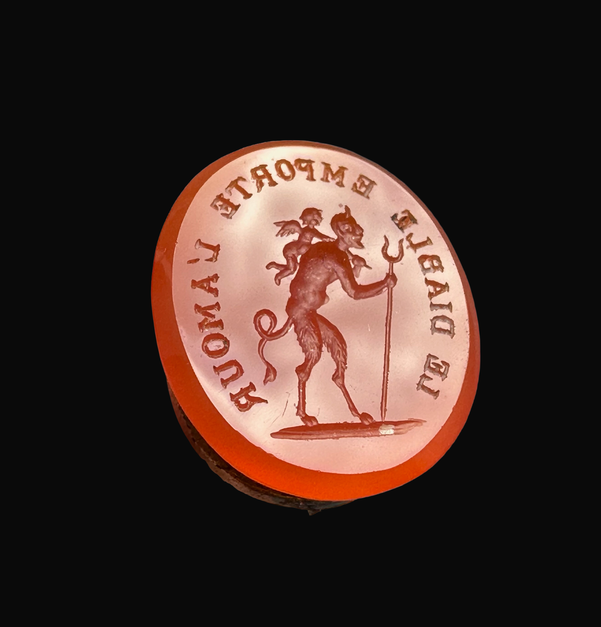 A 19th c. Puss in Boots gilt-metal fob seal with carnelian intaglio "Le diable emporte l'Amour".
