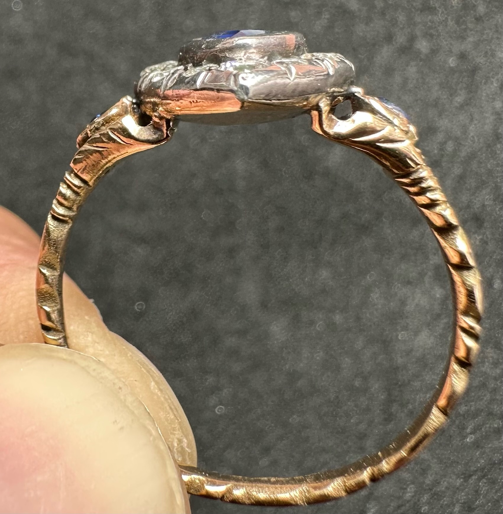 A 19th-century heart-shaped sapphire and diamond ring, gold and silver.