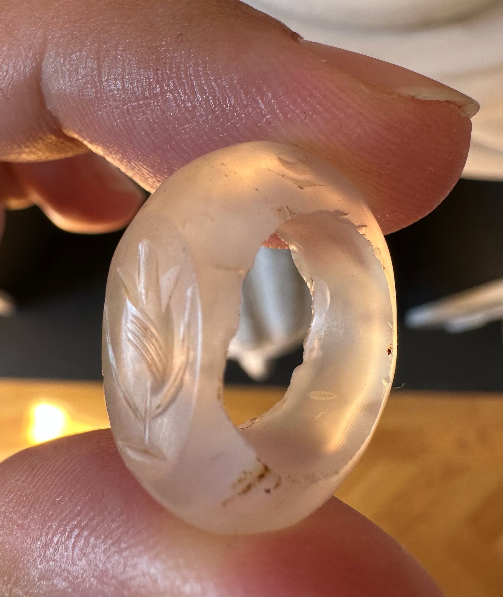 A Sasanian hololithic chalcedony seal ring. Flower.