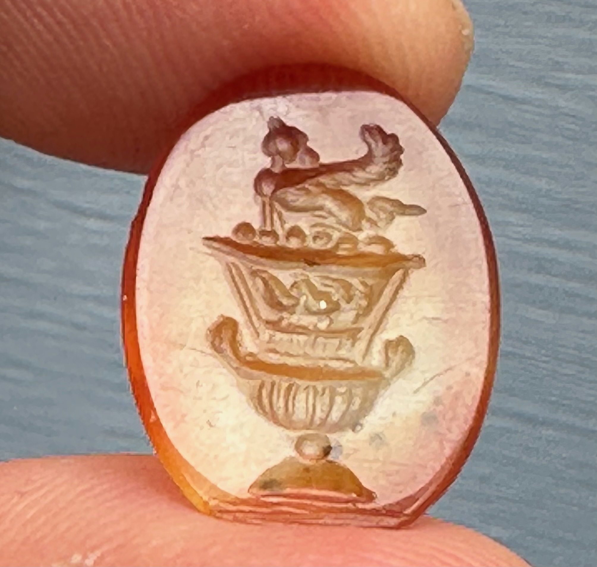 A large Roman agate intaglio. Sphinx on a bell-krater.
