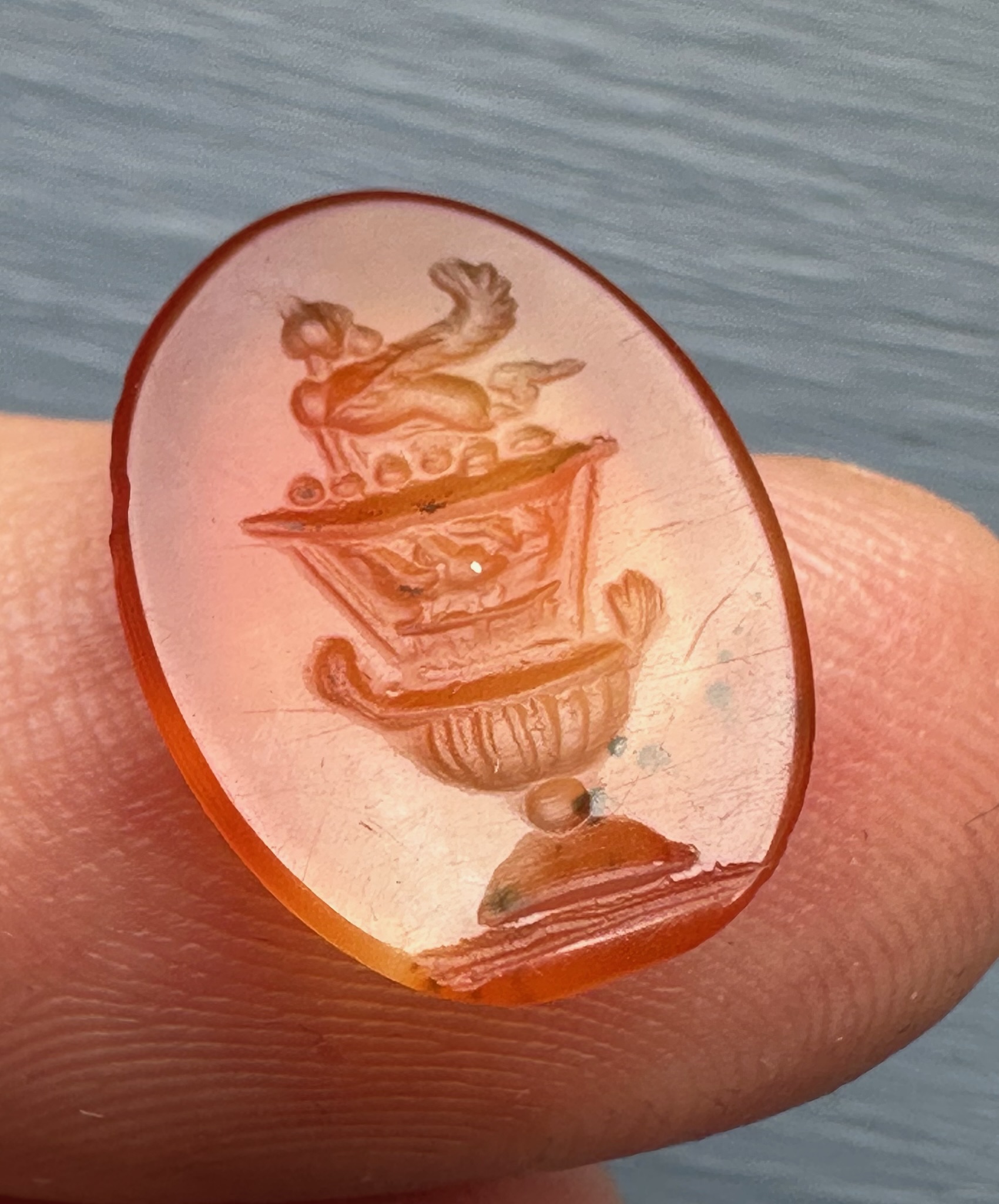 A large Roman agate intaglio. Sphinx on a bell-krater.
