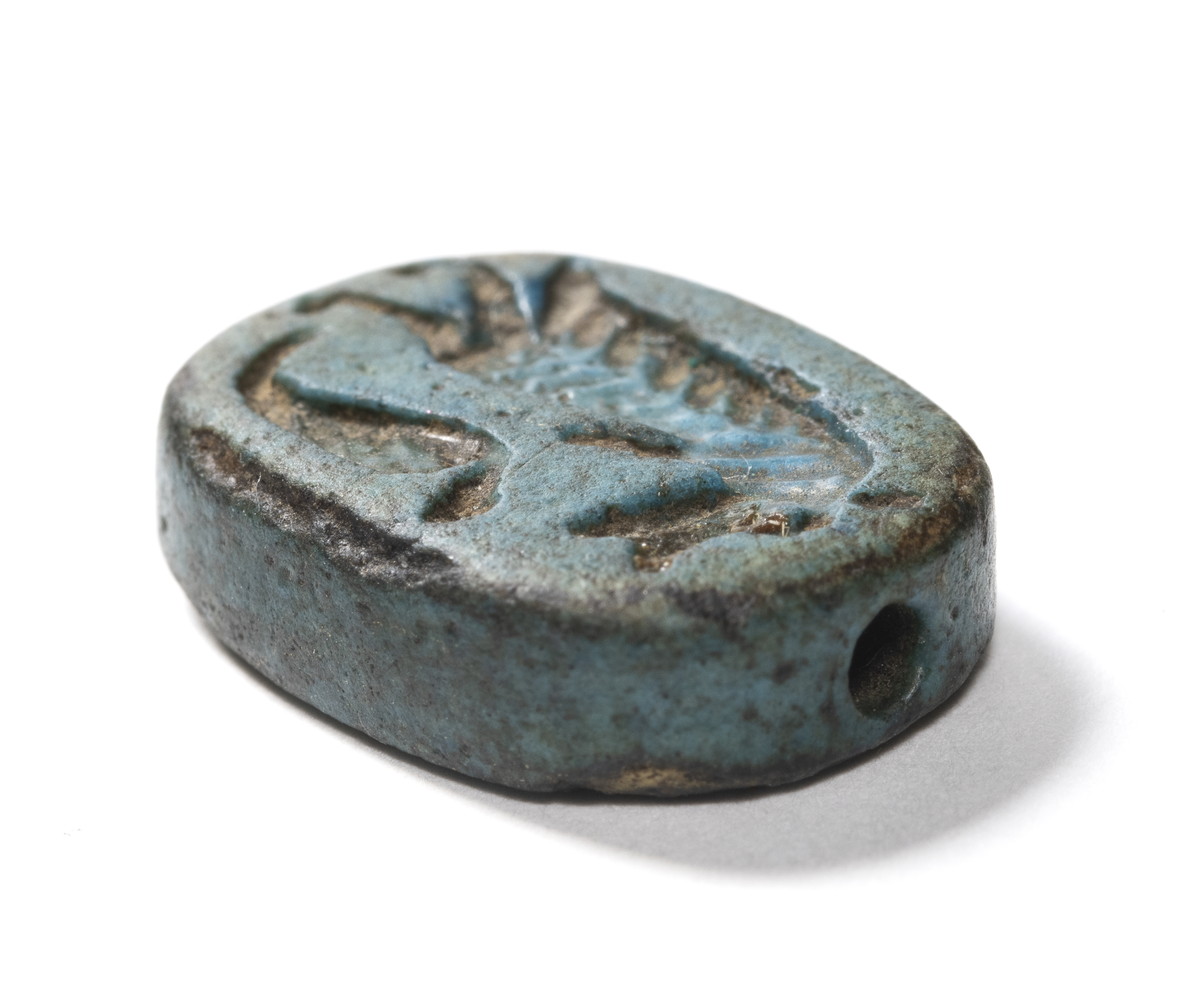 New-Kingdom, A New-Kingdom blue faience scaraboid engraved seal. (1550-1070 BCE)