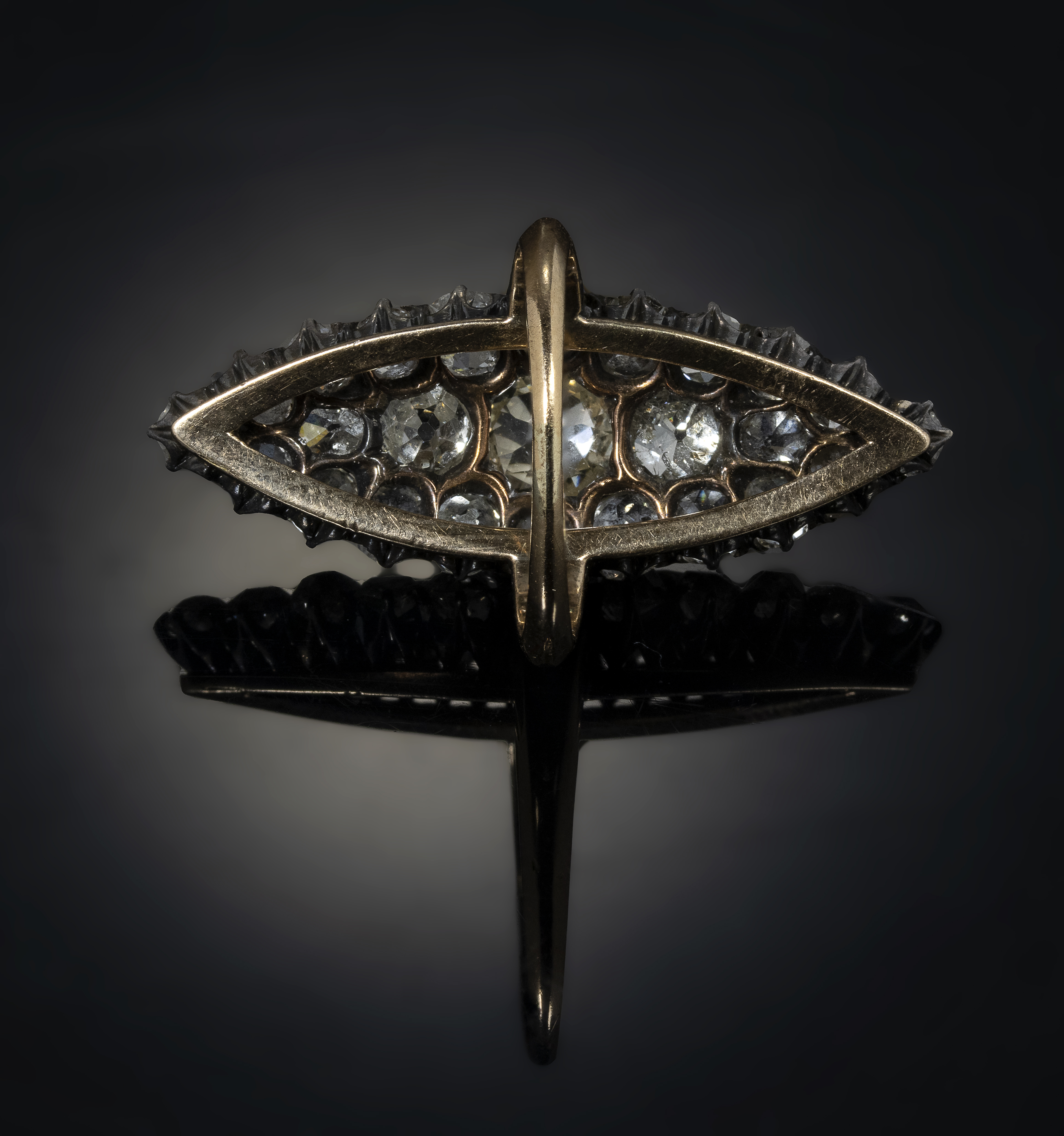 A Late 19th century Navette Cluster gold ring with diamonds.