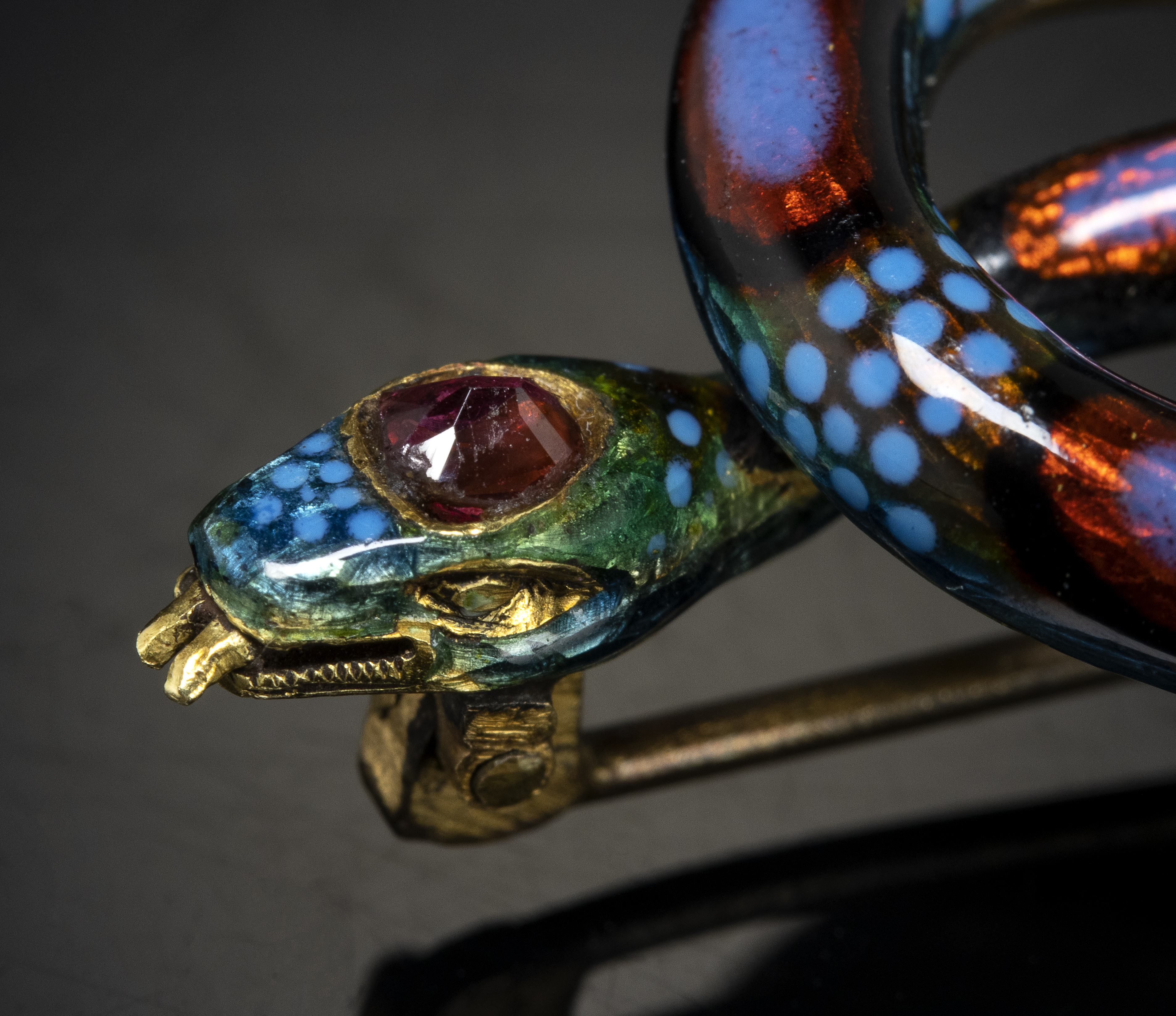 A Late 19th c. French gold and enamel snake brooch. (c. 1860)
