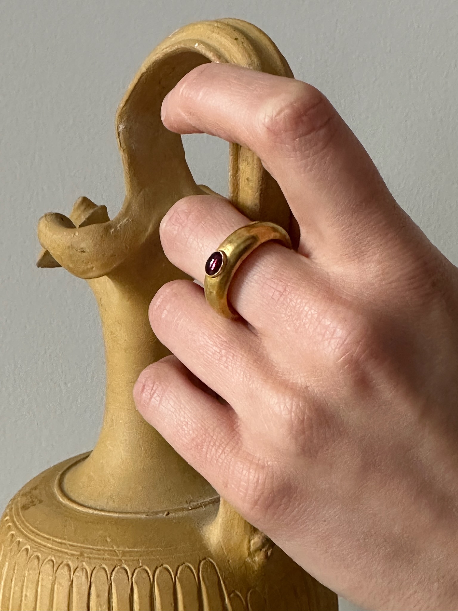 A Roman Gold and Garnet Cabochon ring.