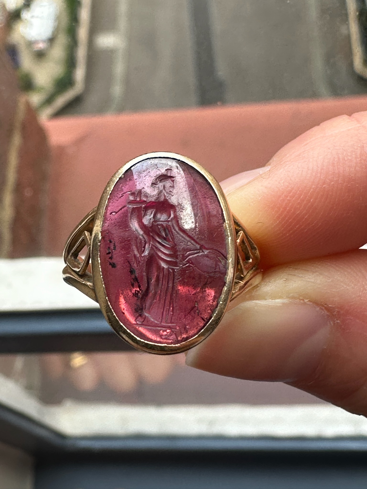 A Greek Late Hellenistic Garnet Intaglio set in a 19th century gold ring. Tyche. 