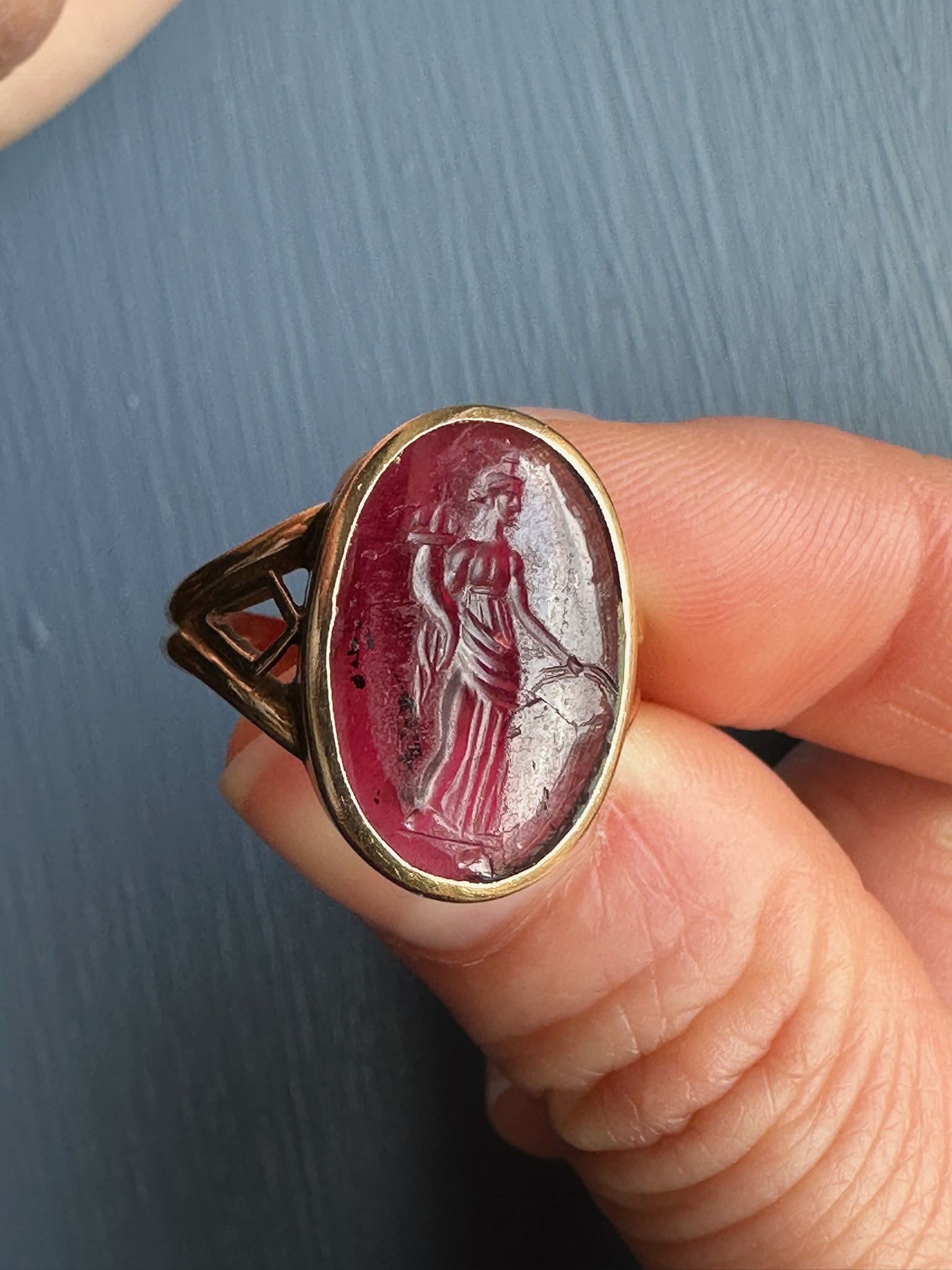 A Greek Late Hellenistic Garnet Intaglio set in a 19th century gold ring. Tyche. 