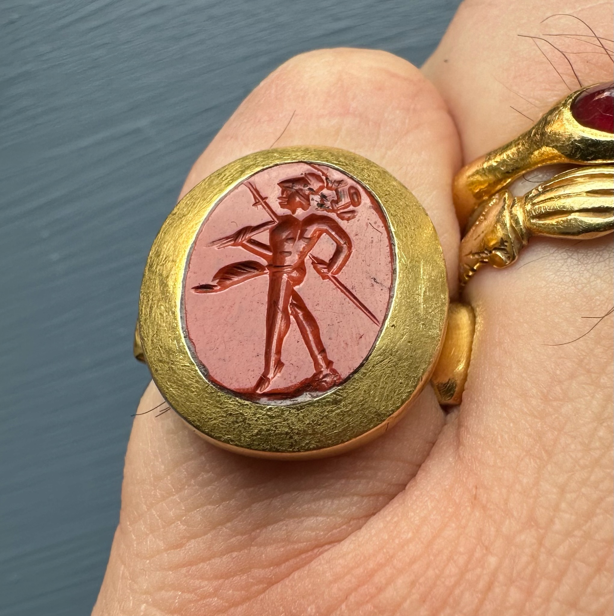 A high carat gold ring set with a Roman red jasper intaglio. Mars Gradivus