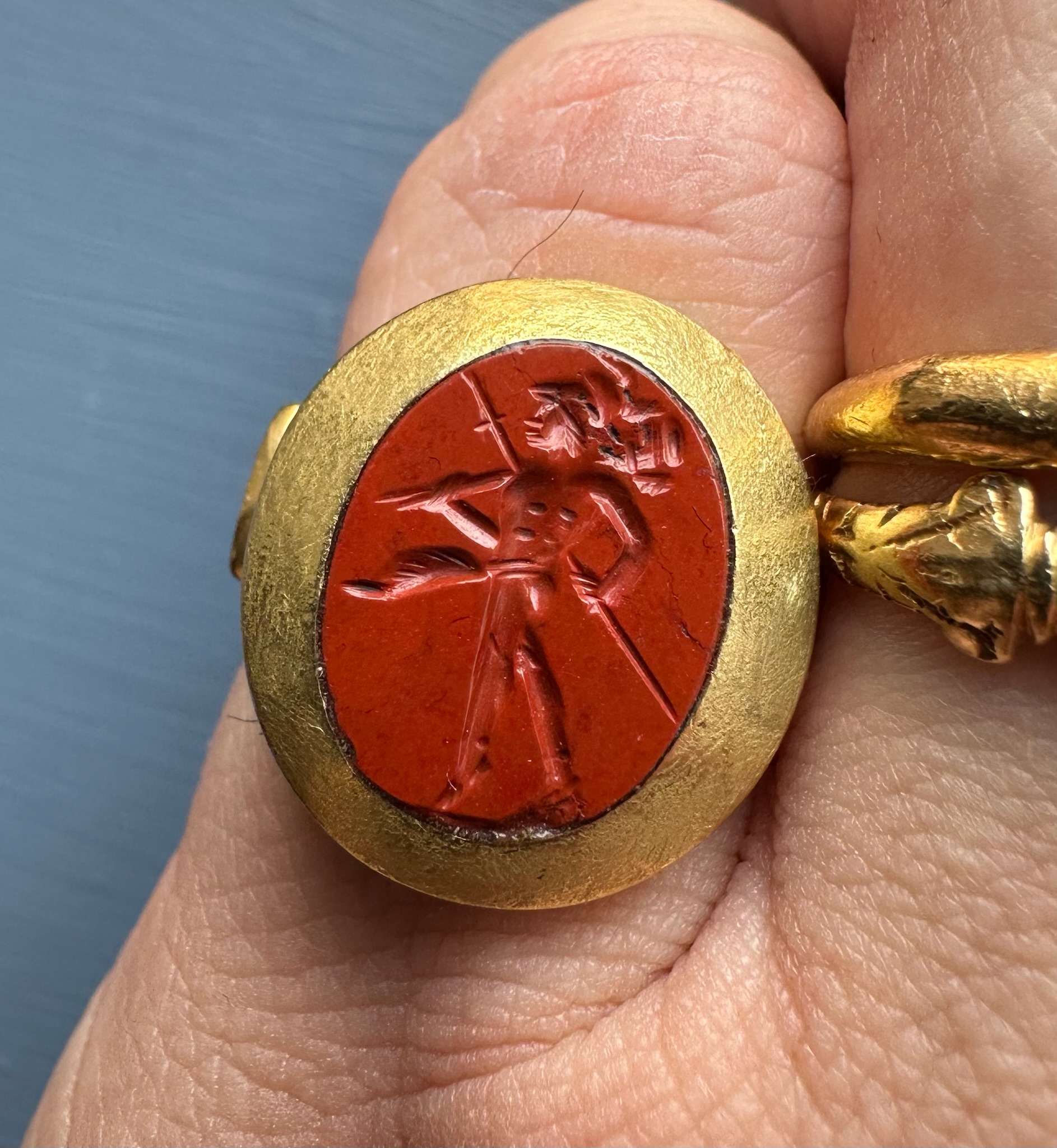 A high carat gold ring set with a Roman red jasper intaglio. Mars Gradivus