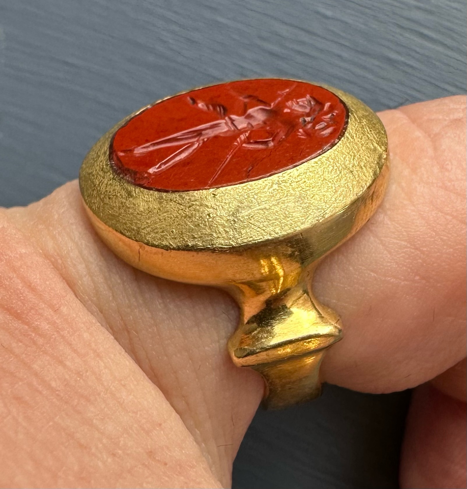 A high carat gold ring set with a Roman red jasper intaglio. Mars Gradivus