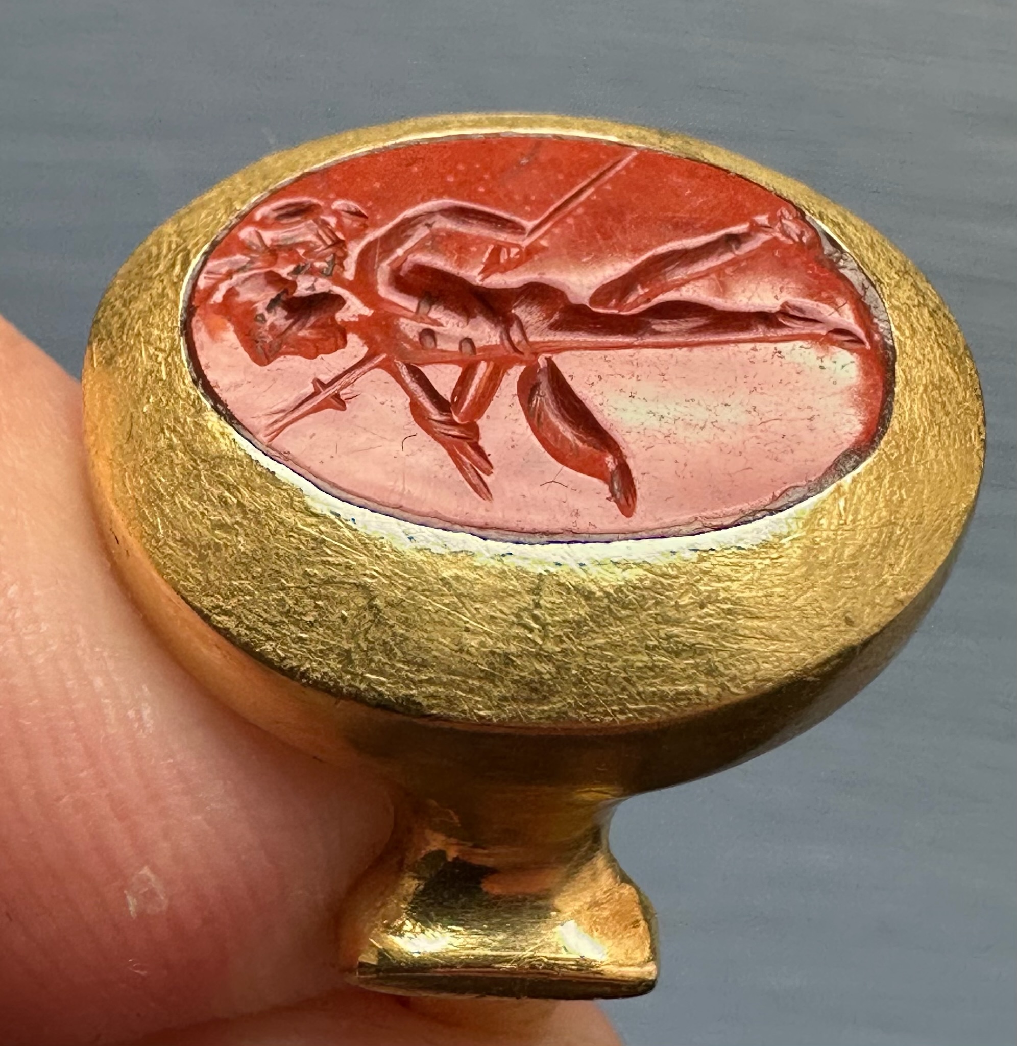A high carat gold ring set with a Roman red jasper intaglio. Mars Gradivus