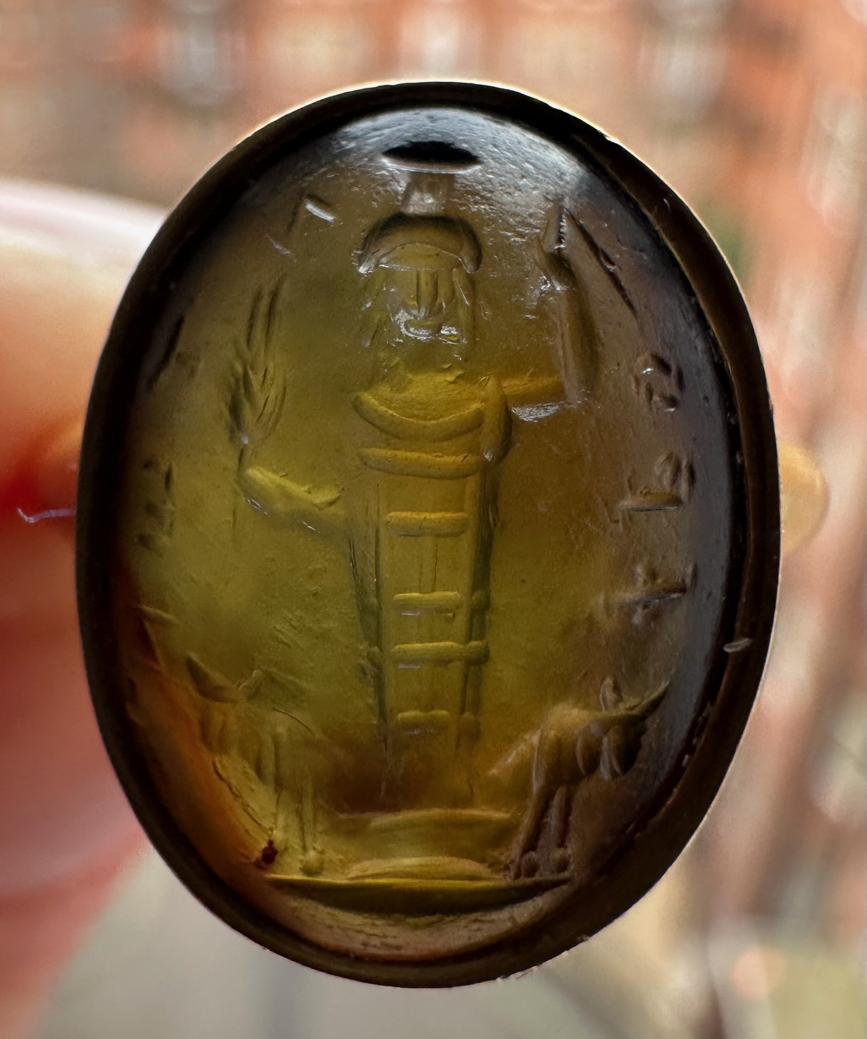 A gold Signet Ring set with a Roman Magical Prasium Intaglio. Jupiter Heliopolitanus