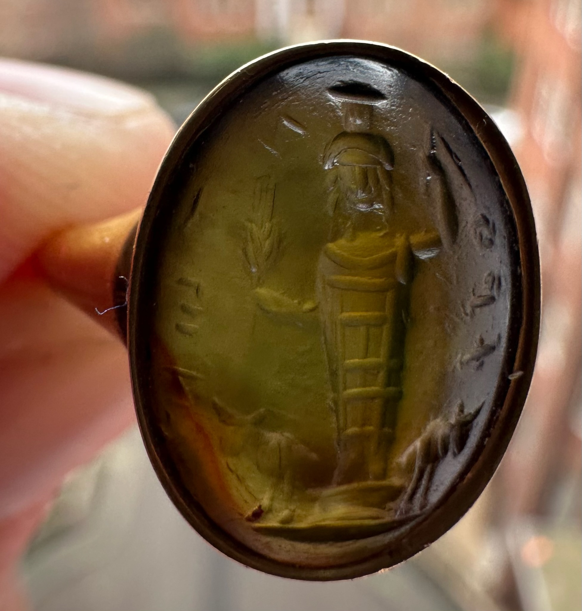 A gold Signet Ring set with a Roman Magical Prasium Intaglio. Jupiter Heliopolitanus