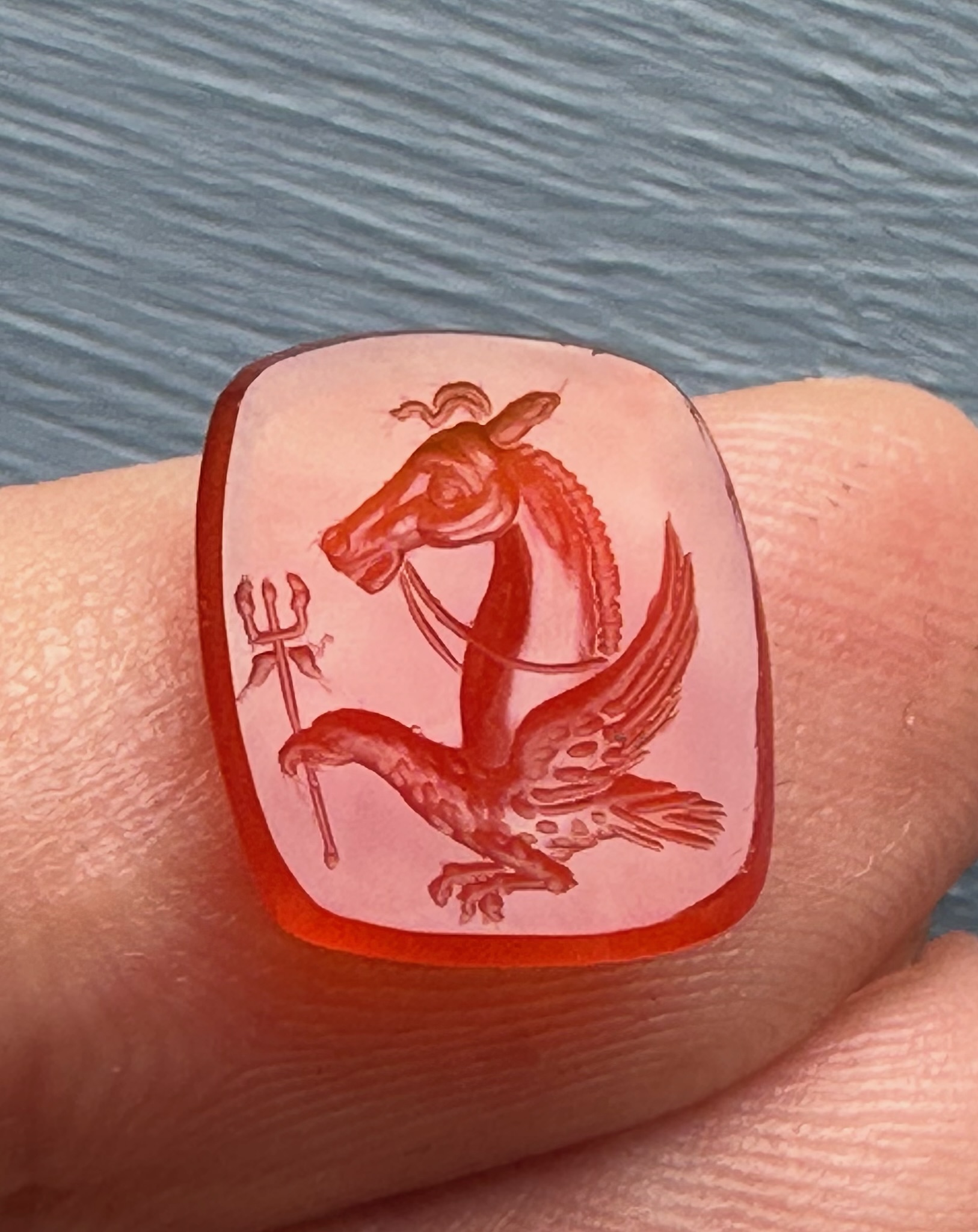 A Victorian carnelian engraved seal. Allegorical figure