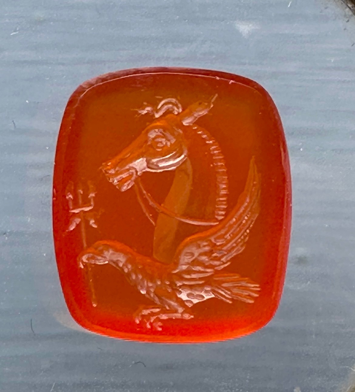 A Victorian carnelian engraved seal. Allegorical figure