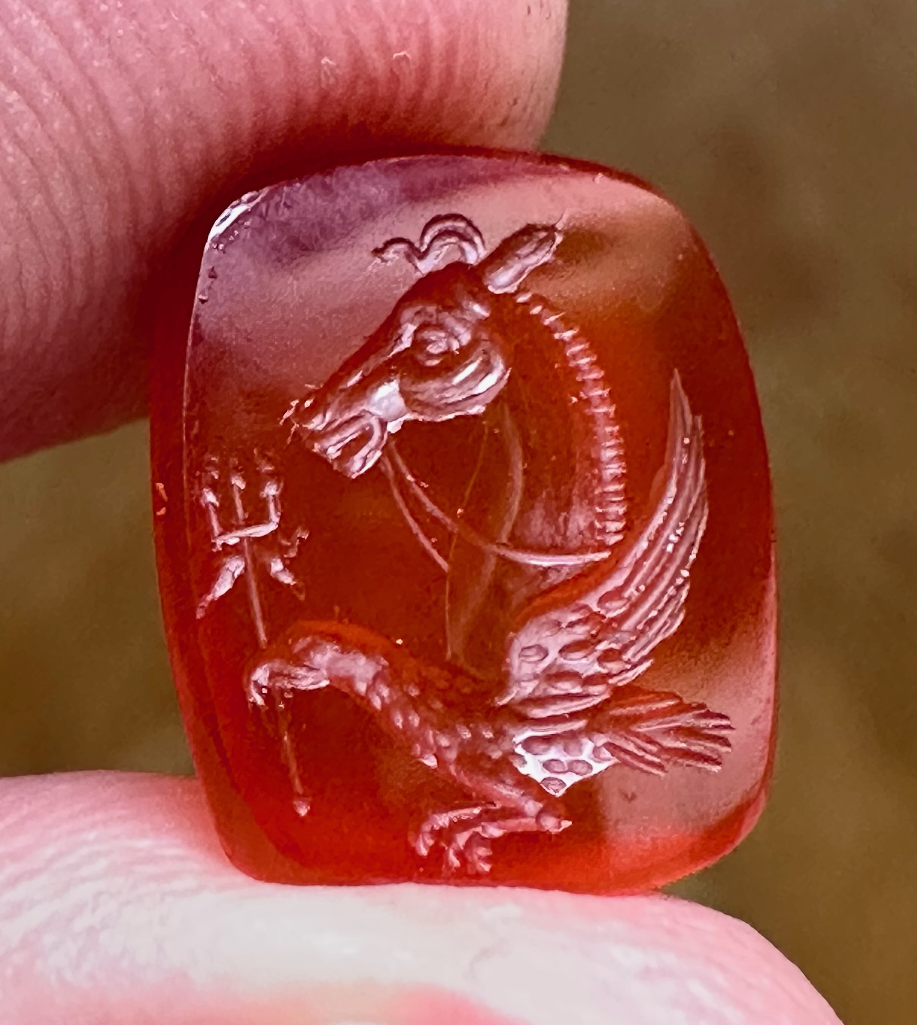 A Victorian carnelian engraved seal. Allegorical figure