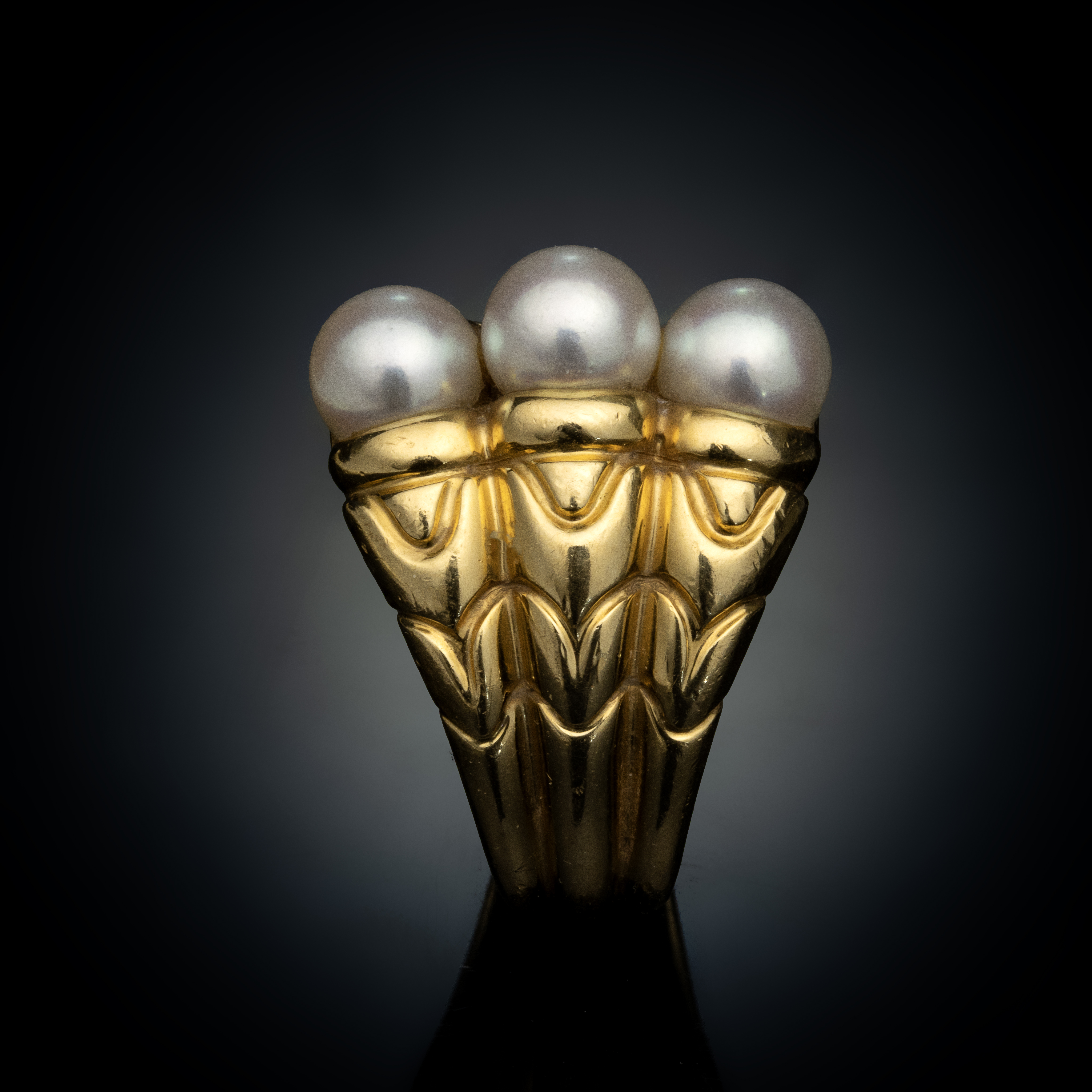 Bulgari. A "Passo Doppio" gold ring with pearls.  (1990s)