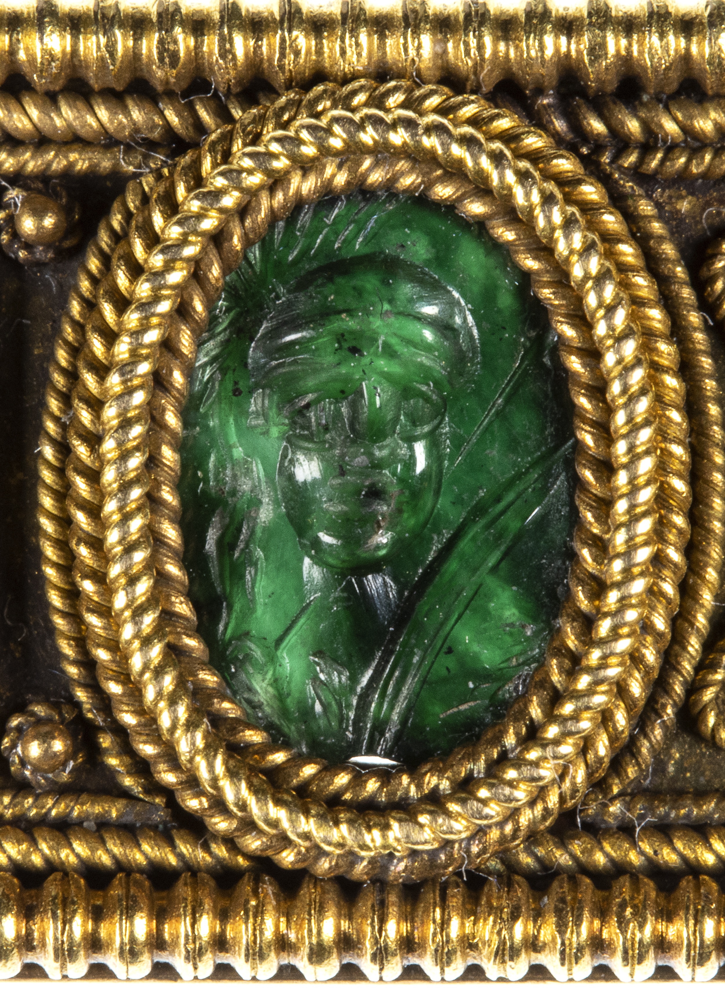 19th century, An Etruscan Revival gold brooch set with Roman green chalcedony intaglios.